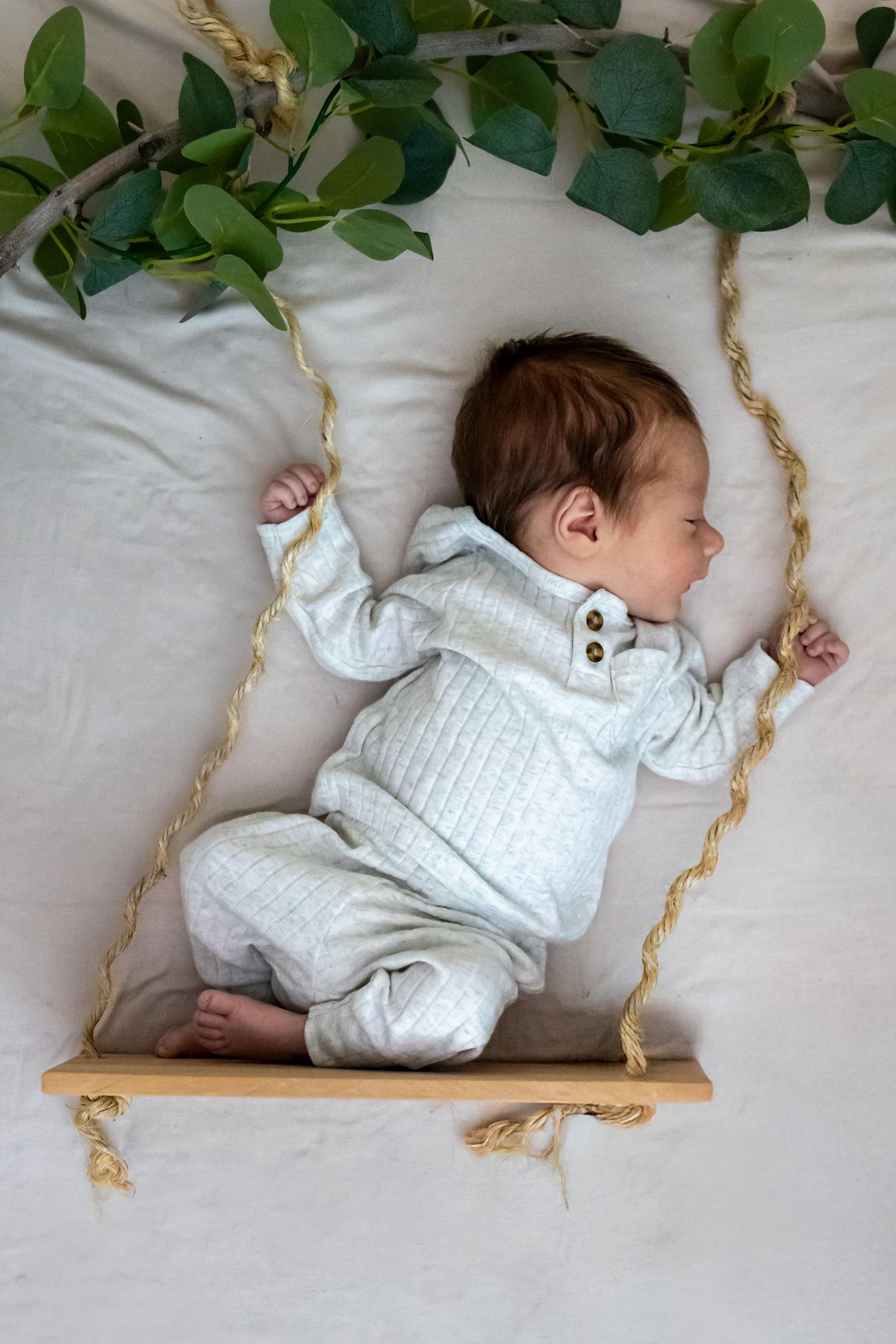 A sleeping baby swinging into his new home in Beaumont.