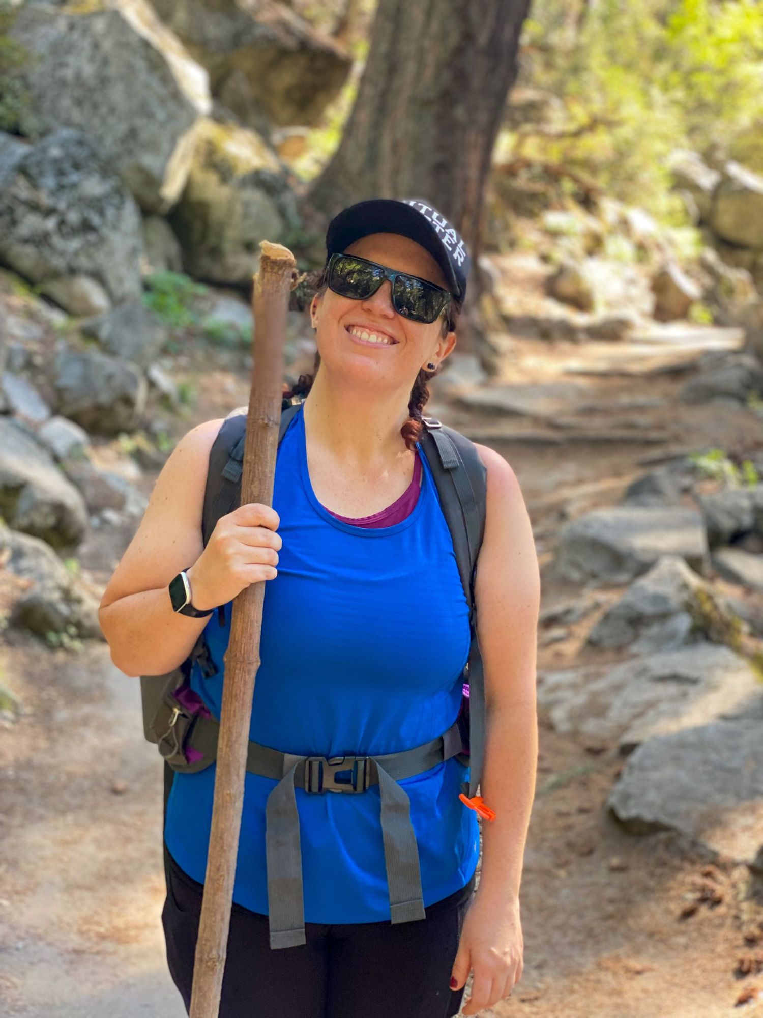 Hilary taking a break while hiking The Mist Trail in Yosemite