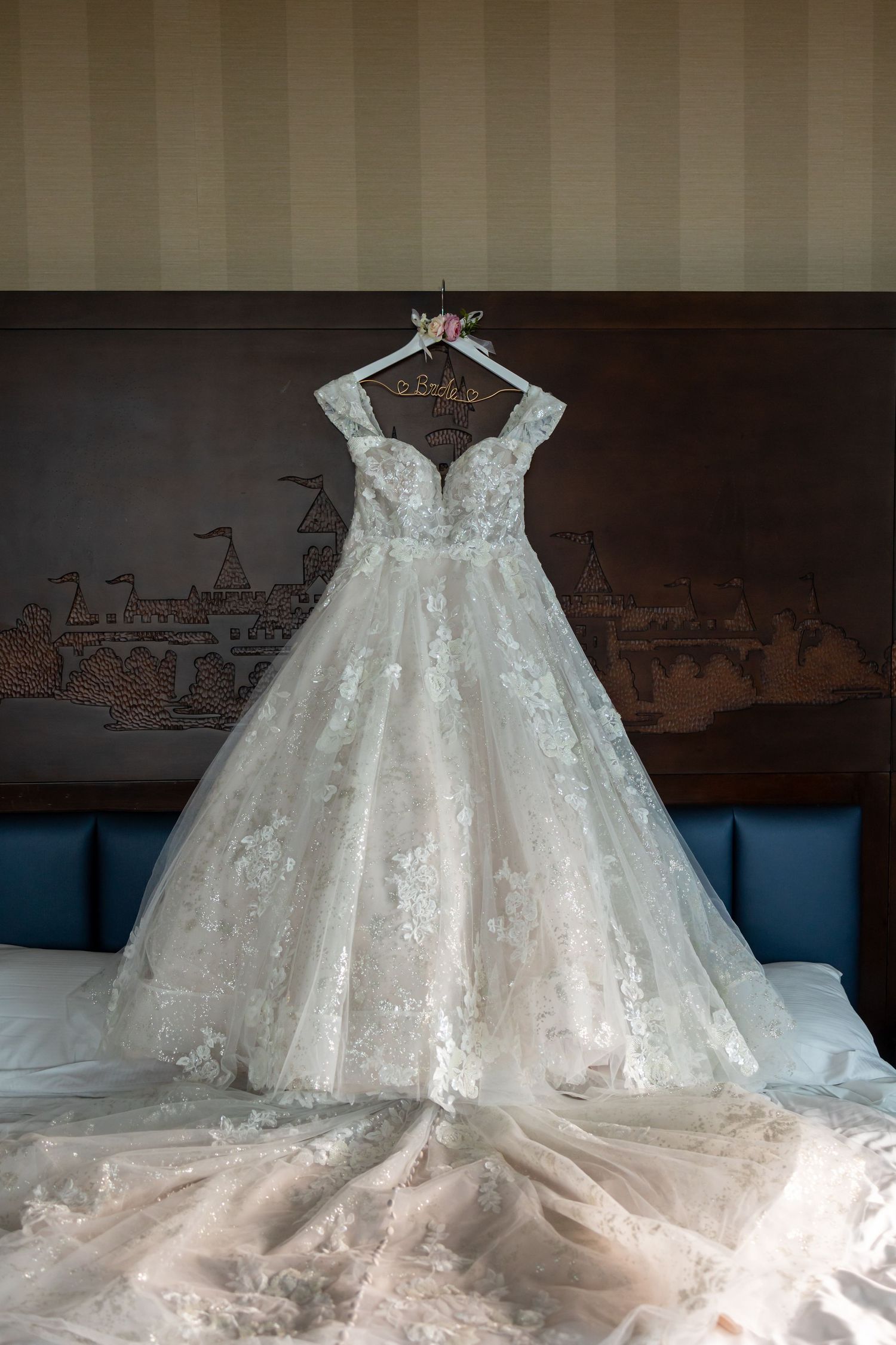 A princess bridal dress hanging in a Disney suite at the Disneyland Hotel in Anaheim