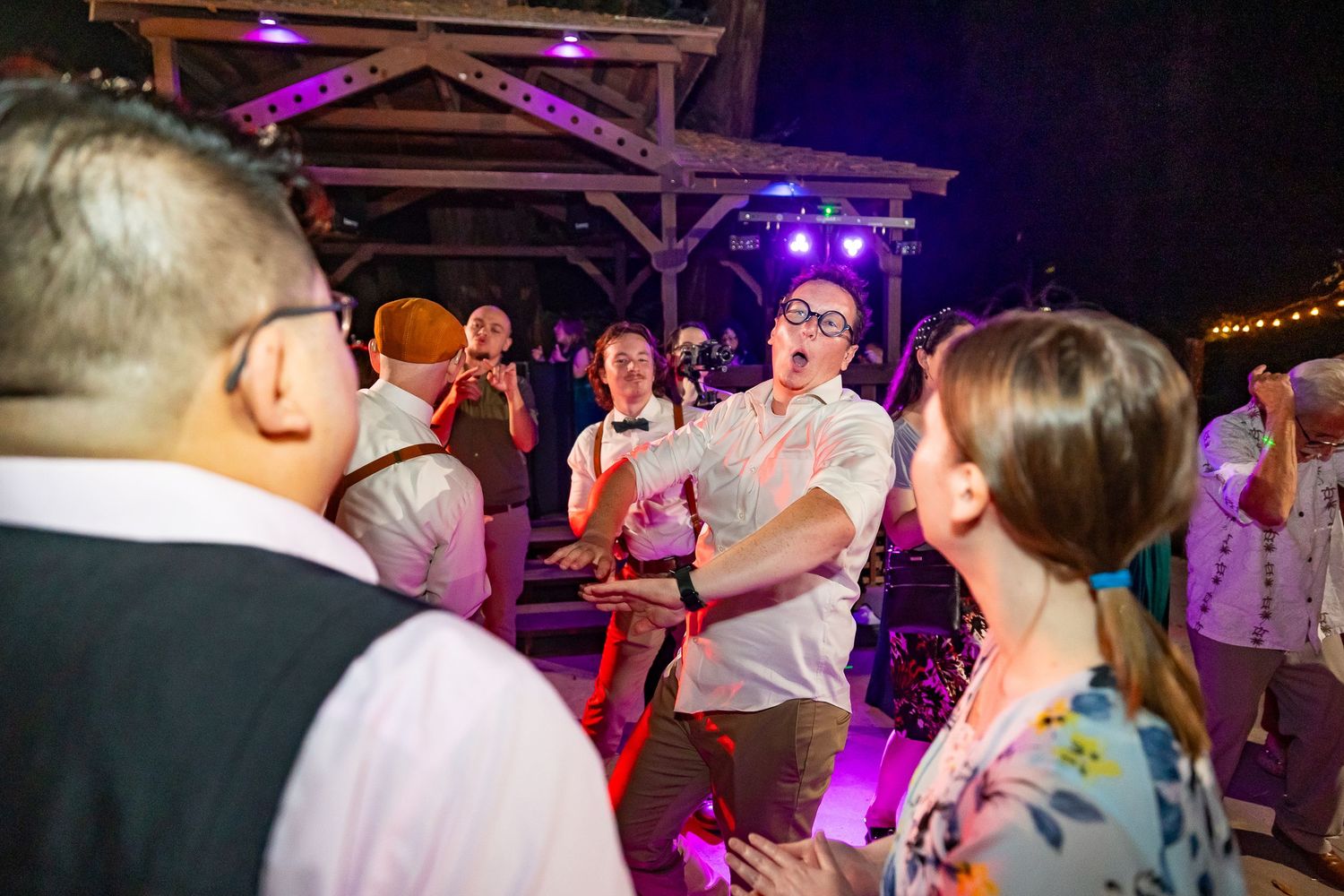 Party guests dancing and socializing at a reception in Felton