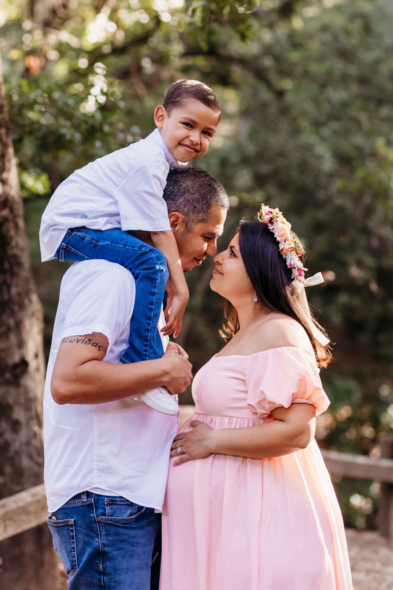 A joyful family portrait capturing love and excitement outdoors.