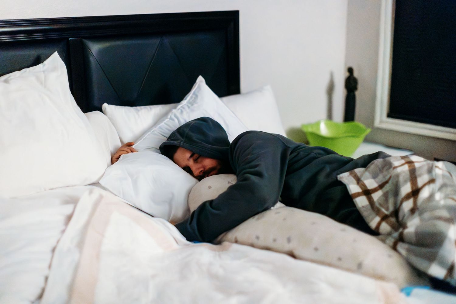 Intimate photography capturing quiet moments during early labor at home.