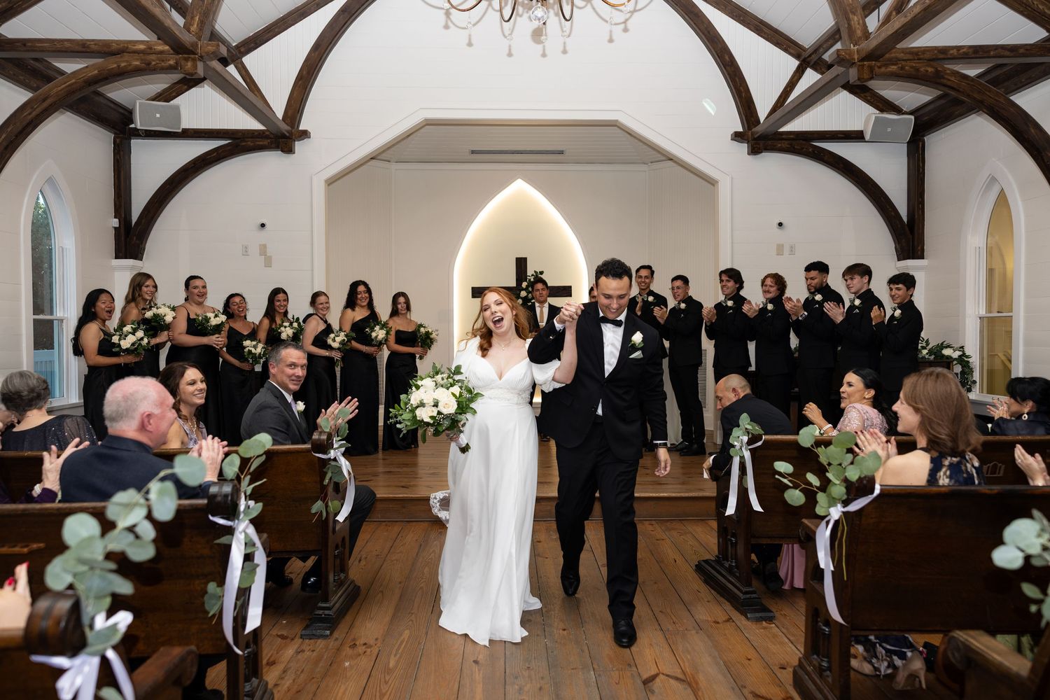 A sequence of wedding ceremony photos showing formal moments in an elegant chapel venue with arched beams and classic decor.