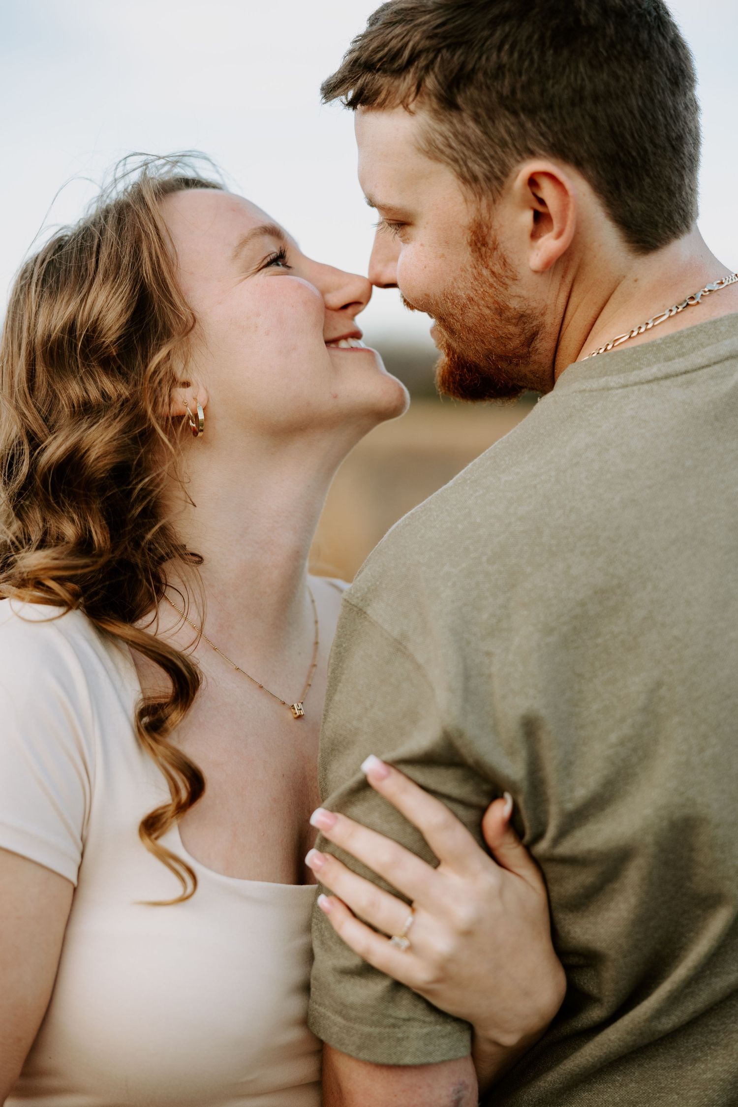 A romantic couple sharing tender kisses in a series of intimate close-up photographs.