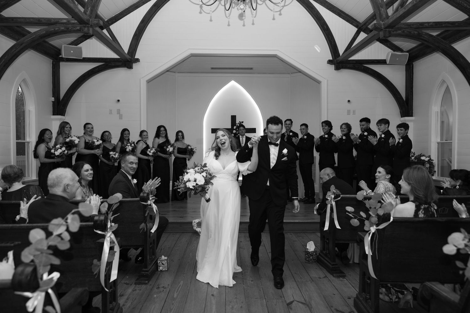 A black and white photo montage showing multiple scenes from a traditional church wedding ceremony and reception.