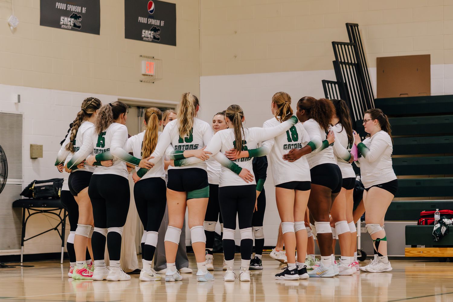 Team huddle before sports game.