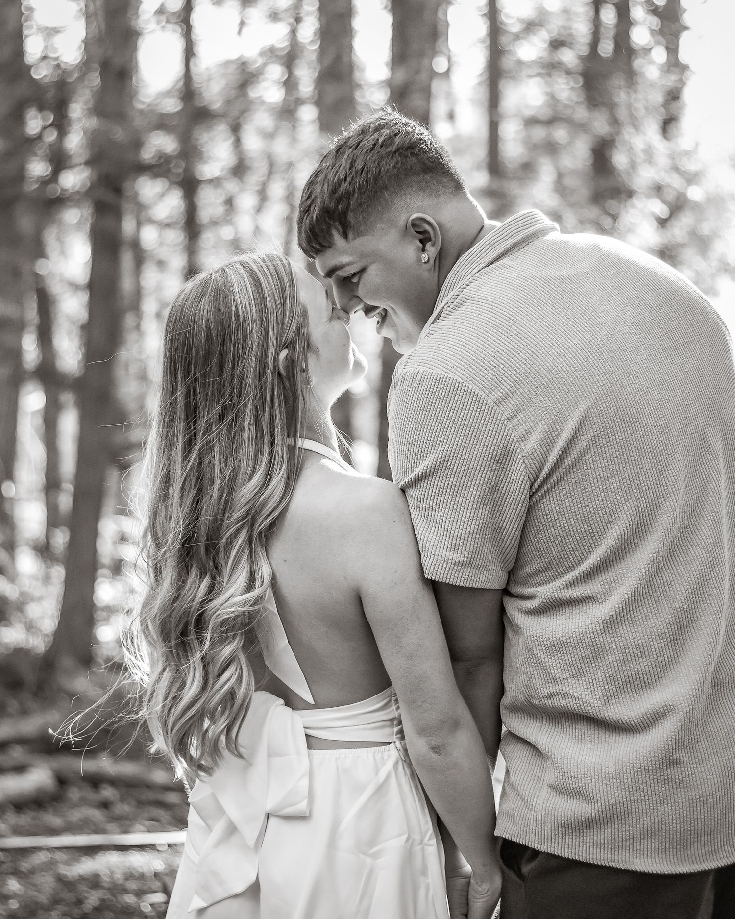 Candid couple moment during engagement session.