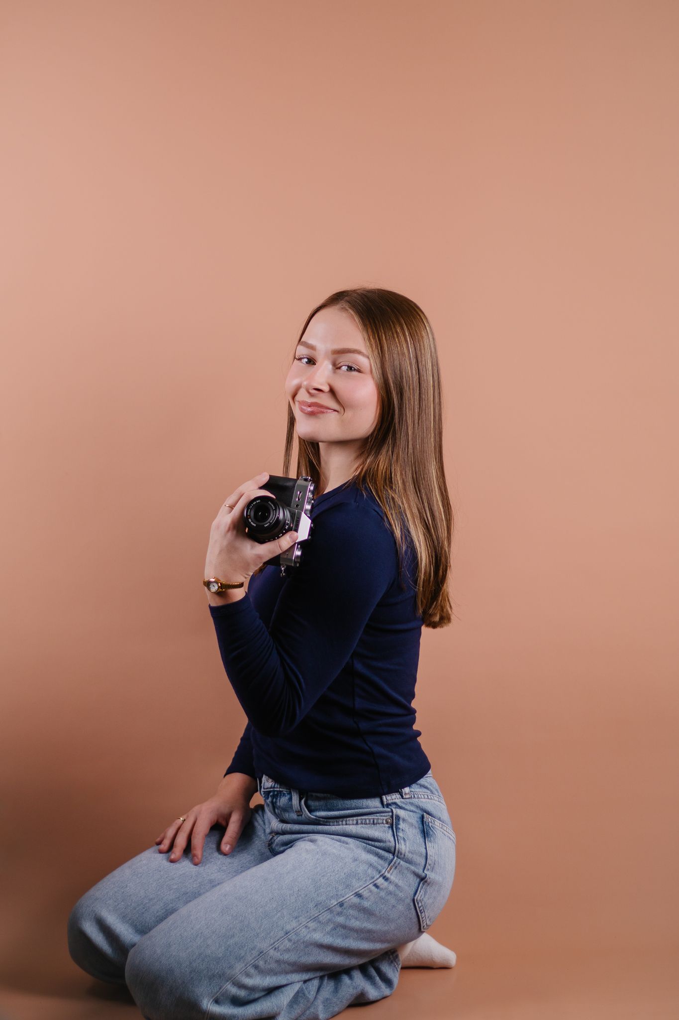 Captured by Macey photographer holding camera.