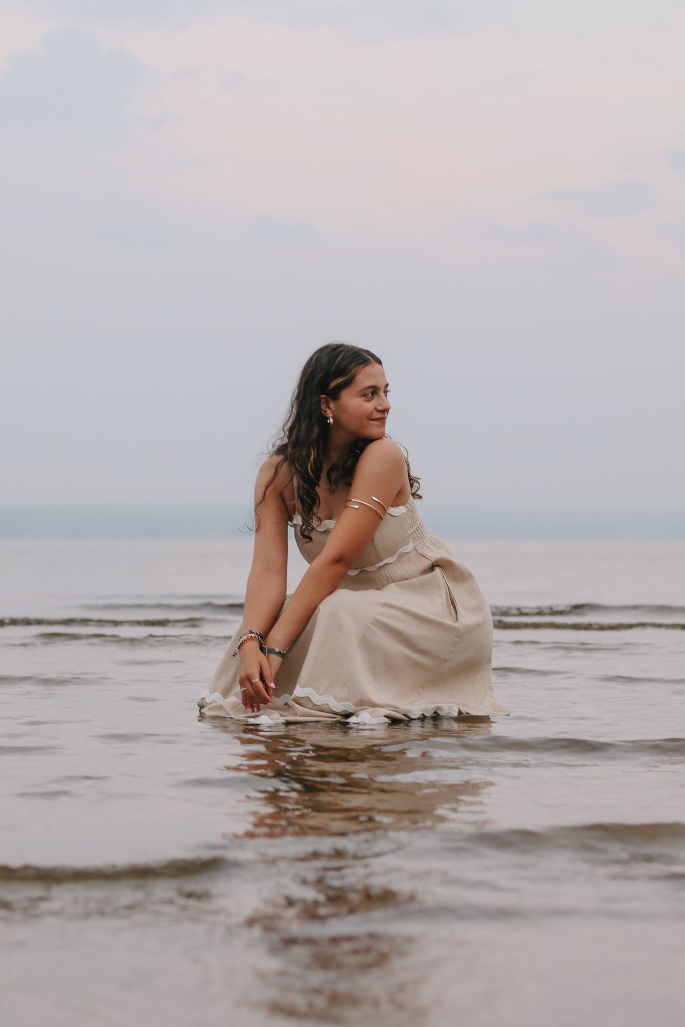 Soft senior portrait session in the water.