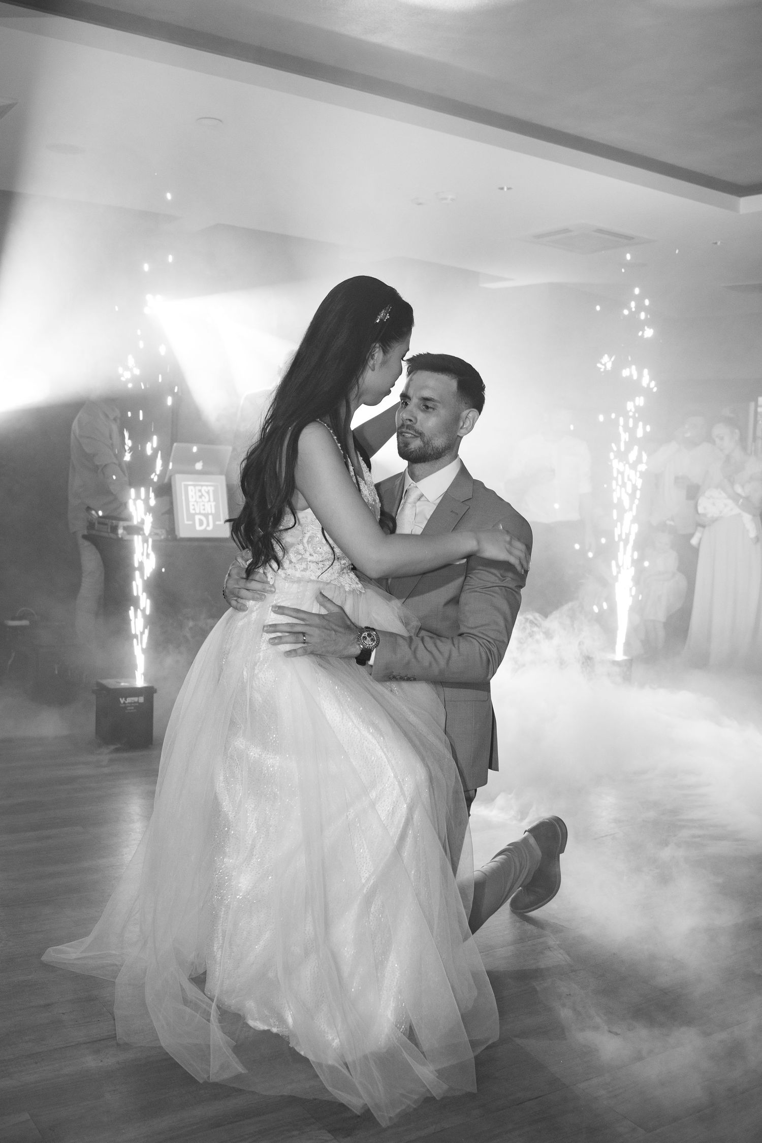 Bride and groom romantic first dance in black and white with fog. Italy wedding photographer and filmmaker