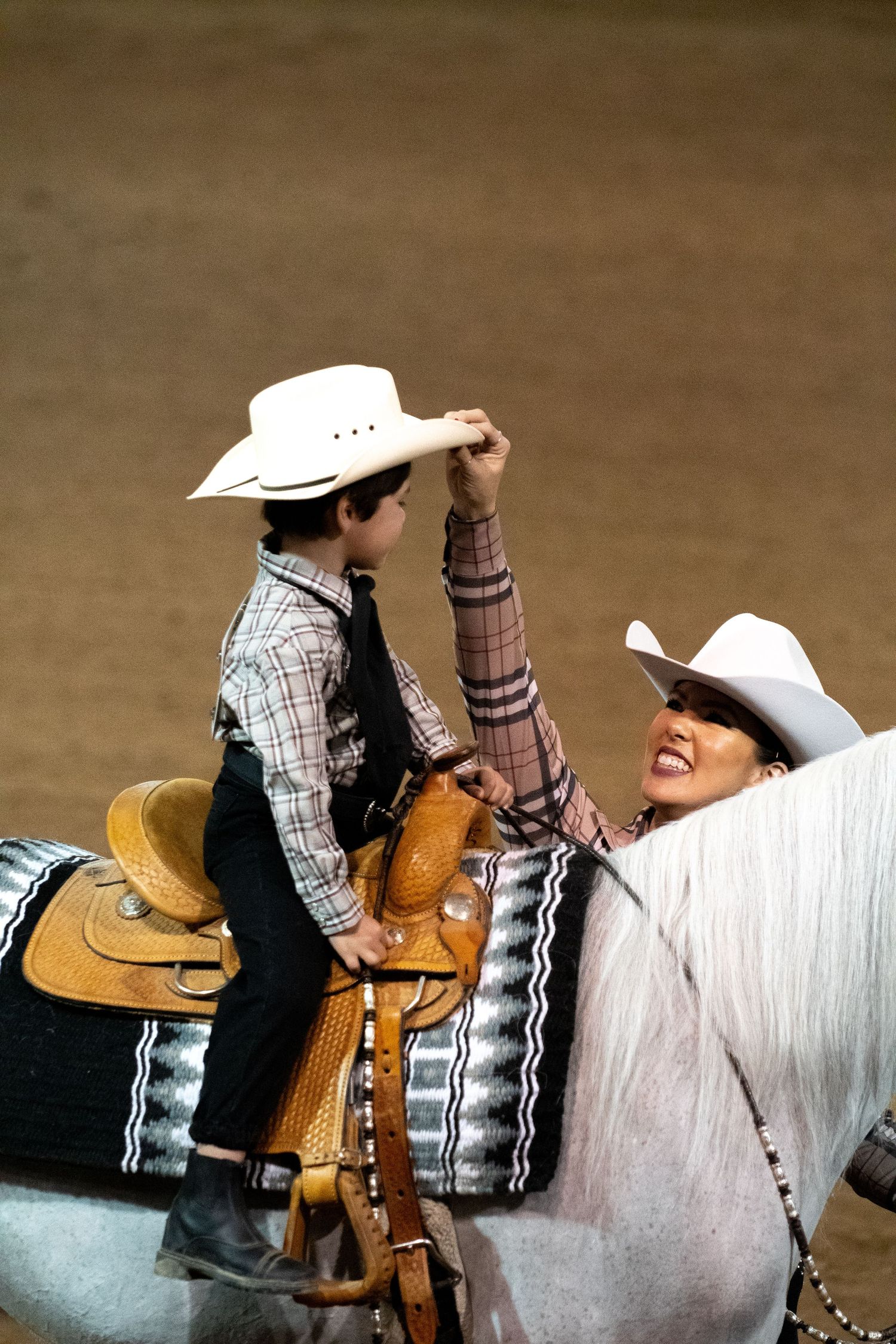 Young child and adult woman in Leadline class