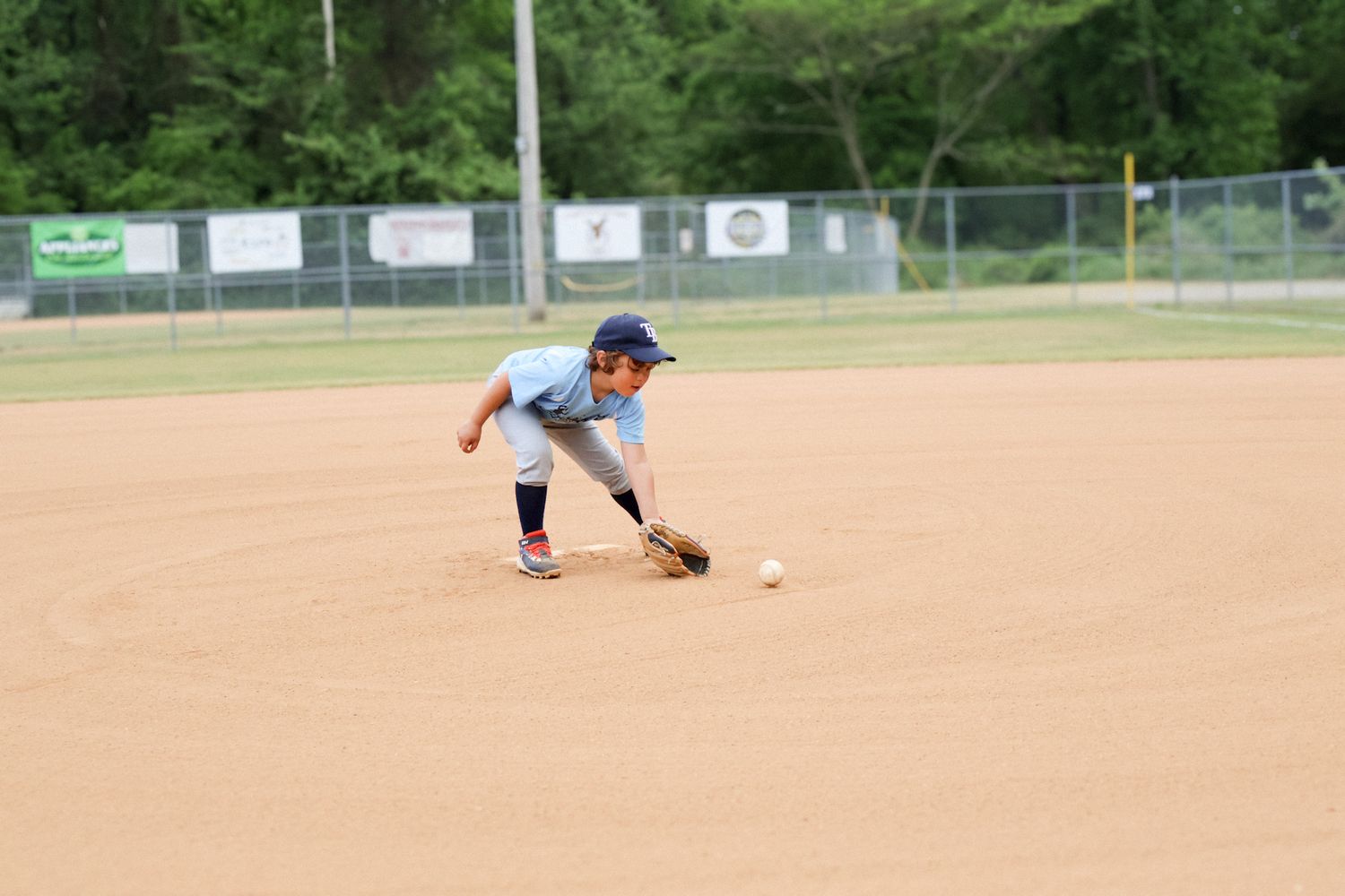 boy playing baseball