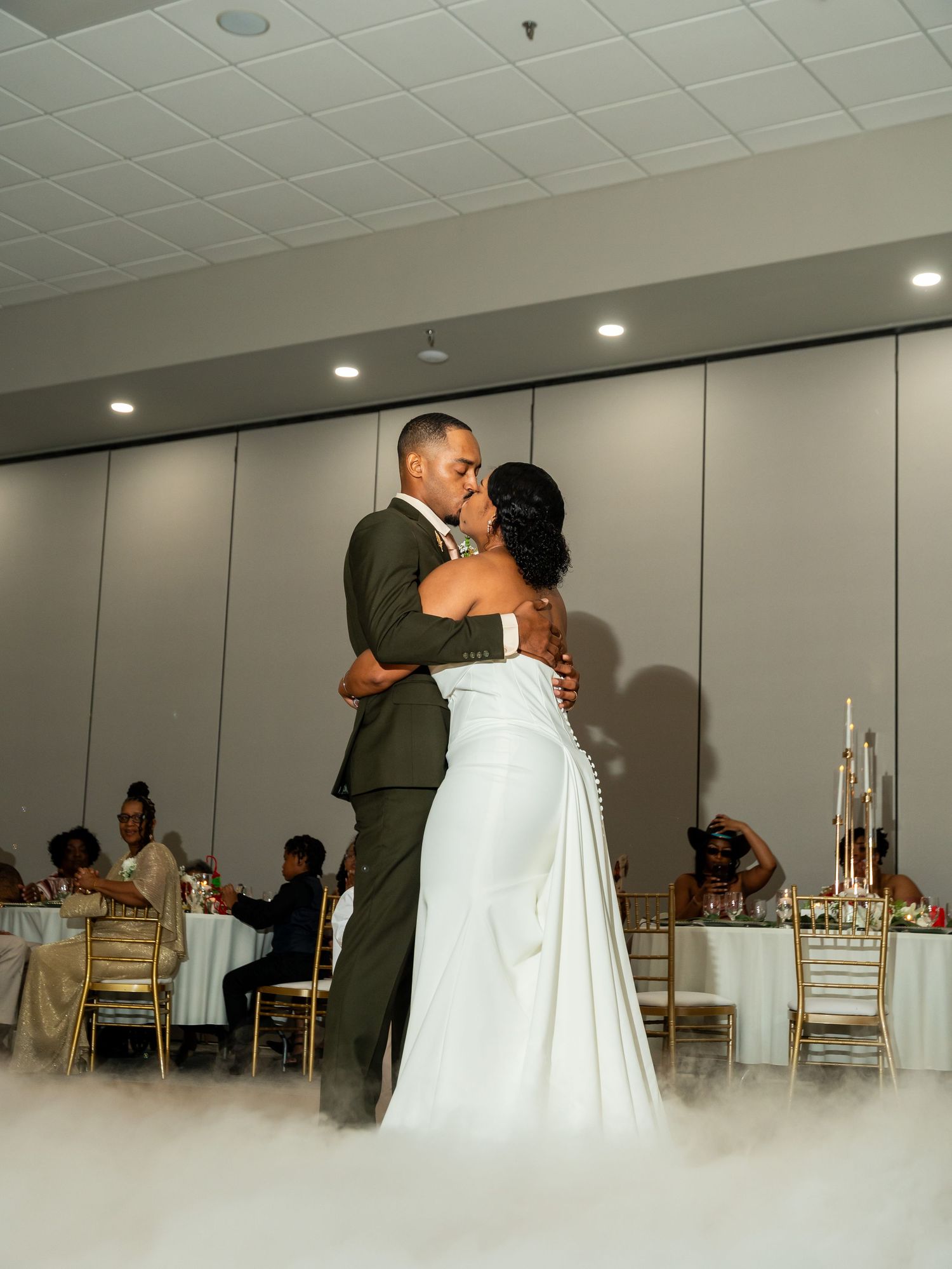 Kayela and Isaac share their first dance at their wedding reception.