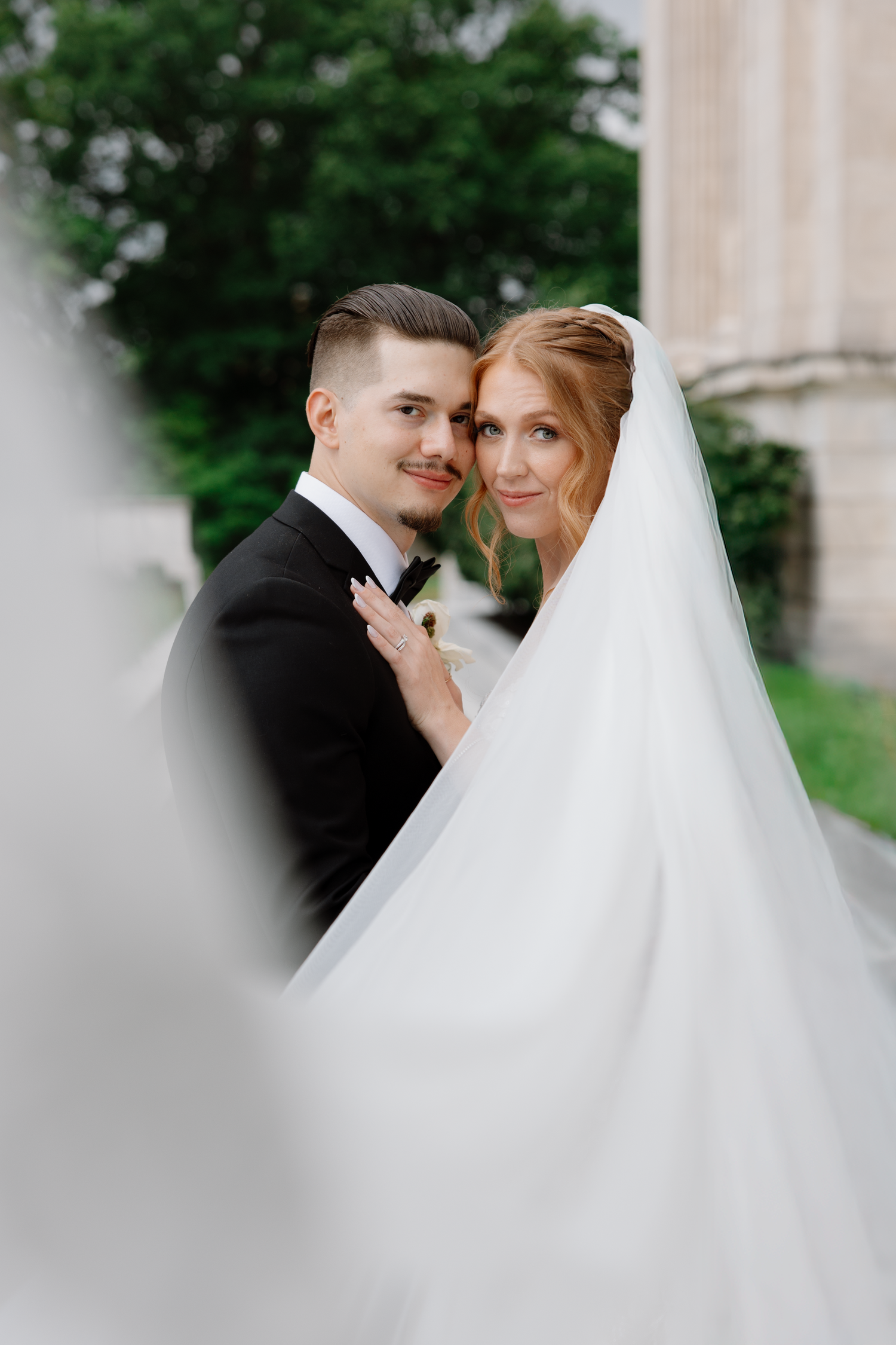 Romantic wedding couple in elegant attire share intimate moments in sequence of soft-focus outdoor portraits.
