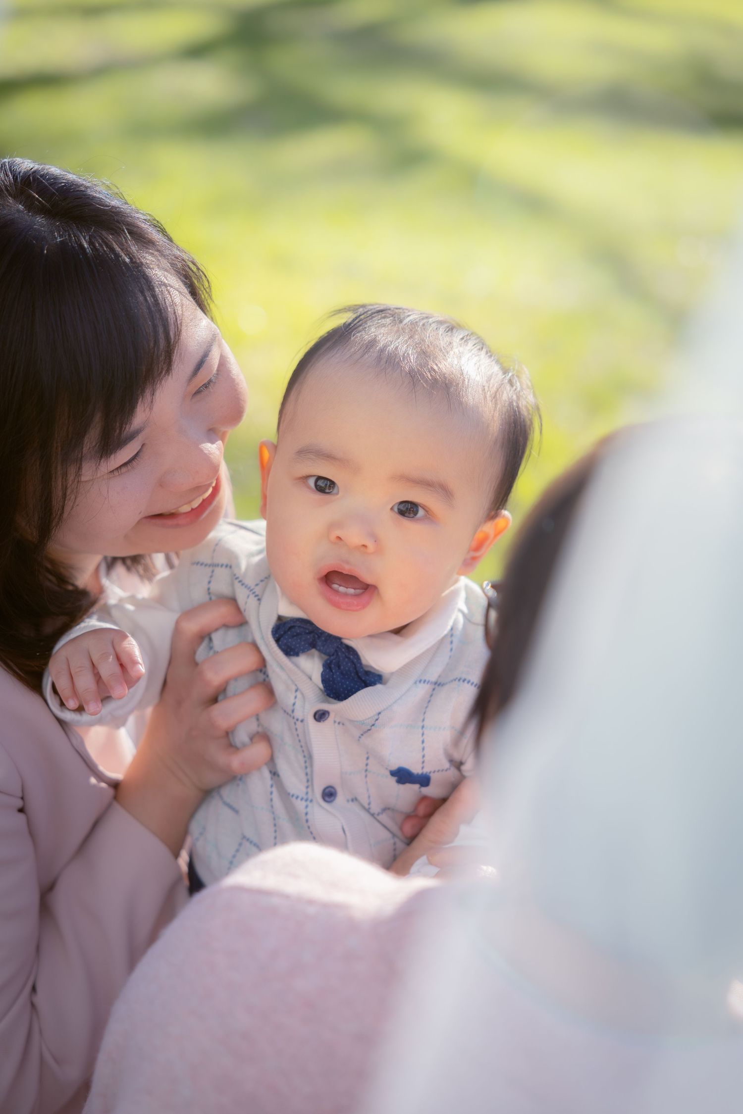 A touching series of candid outdoor photos showing siblings sharing sweet moments together on a sunny day.
