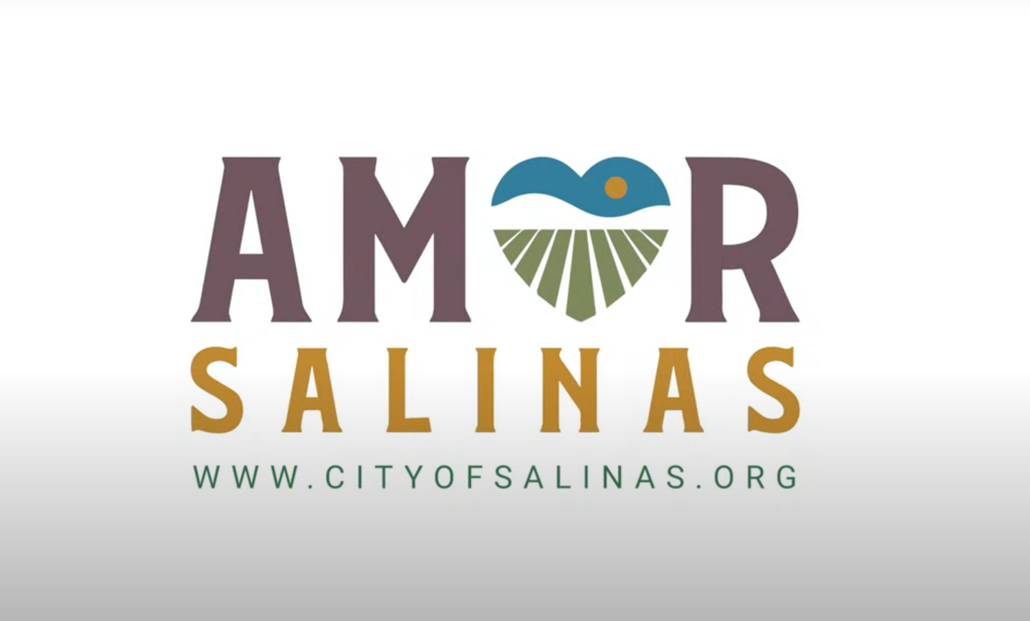 Amor Salinas city logo featuring a heart shape with blue sky and golden fields design.