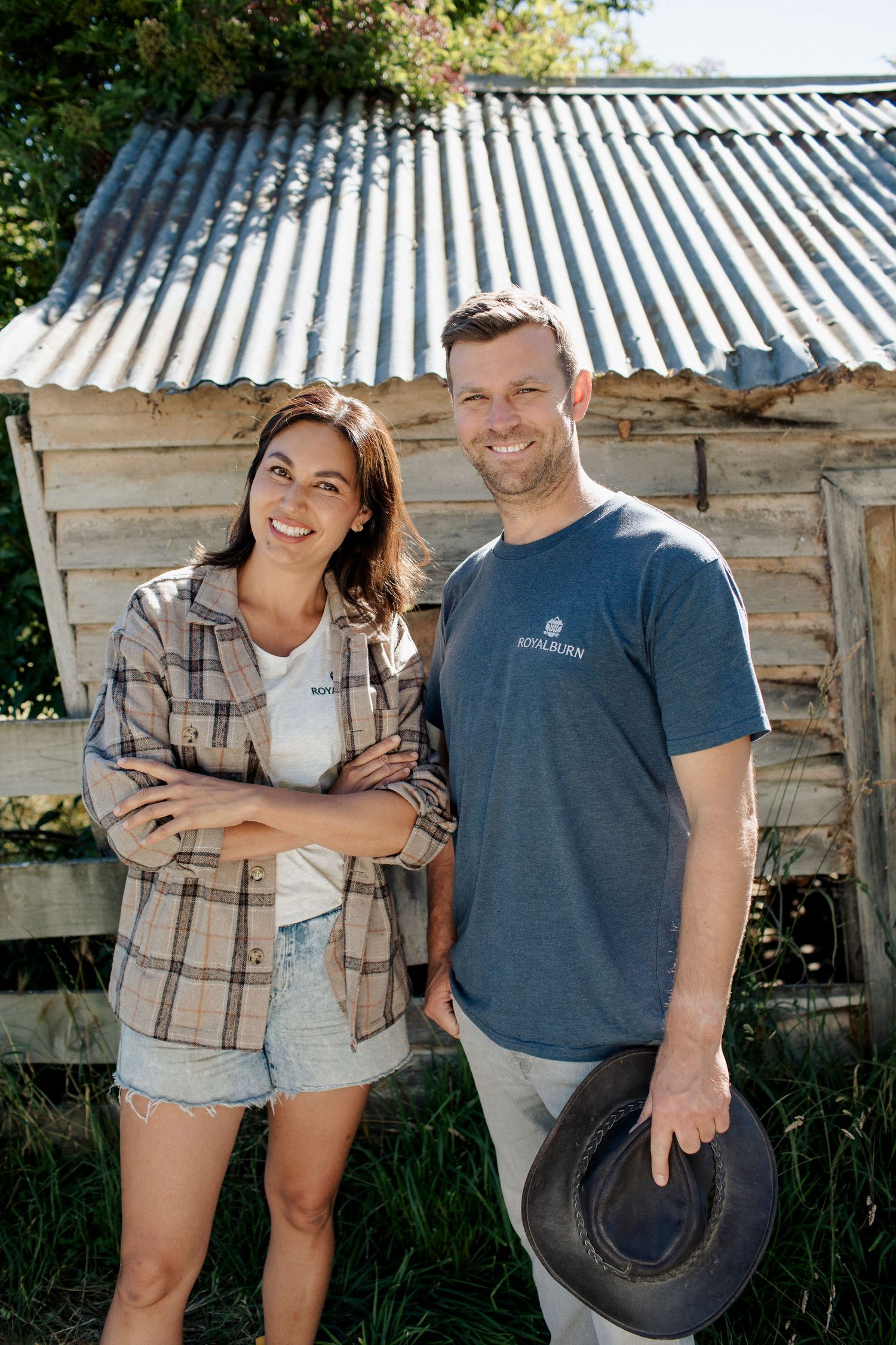 Nadia and Carlos pose for the camera on their farm as part of their TV series Nadia's Farm, directed by Holly Wademan.