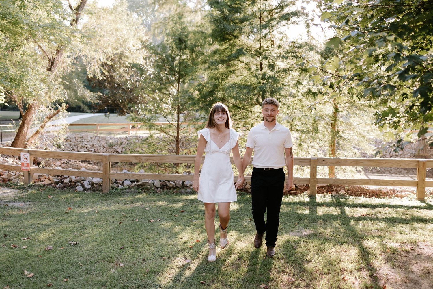 Couple embracing during a romantic elopment session in Auburn, Alabama at Kiesel Park with candid storytelling photography