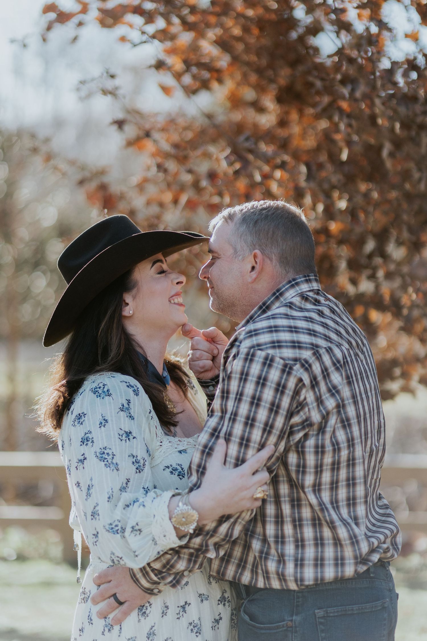 Couple embracing during a romantic elopement session in Auburn, Alabama at Kiesel Park with candid storytelling photography
