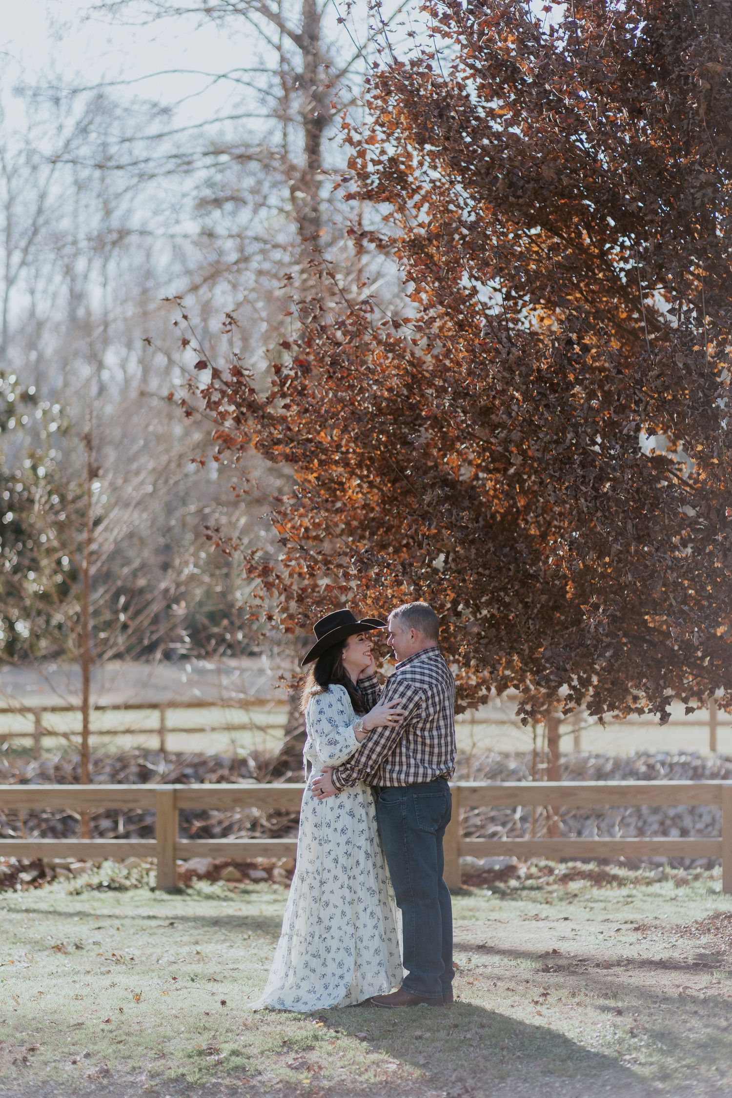 Couple embracing during a romantic elopement session in Auburn, Alabama at Kiesel Park with candid storytelling photography