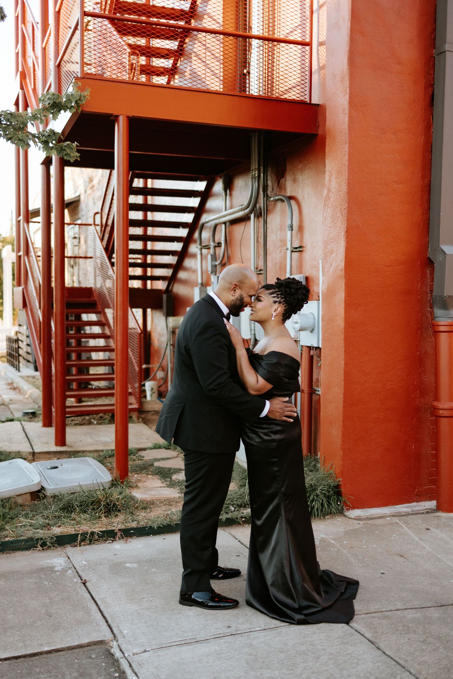 Couple embracing during a romantic elopement session in Opelika, Alabama with candid storytelling photography
