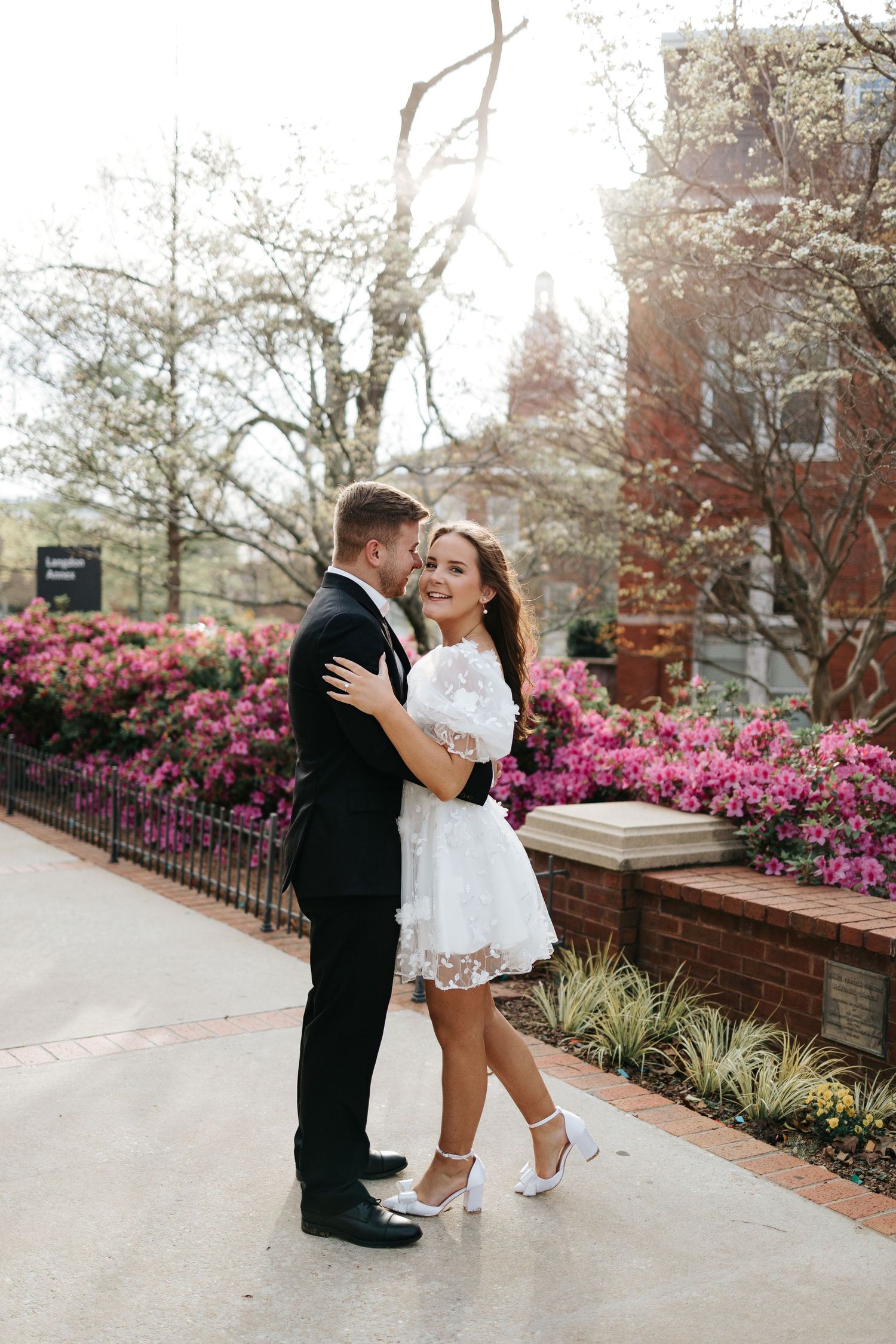 Engagement session in Auburn Univeristy featuring a couple in a romantic, natural setting