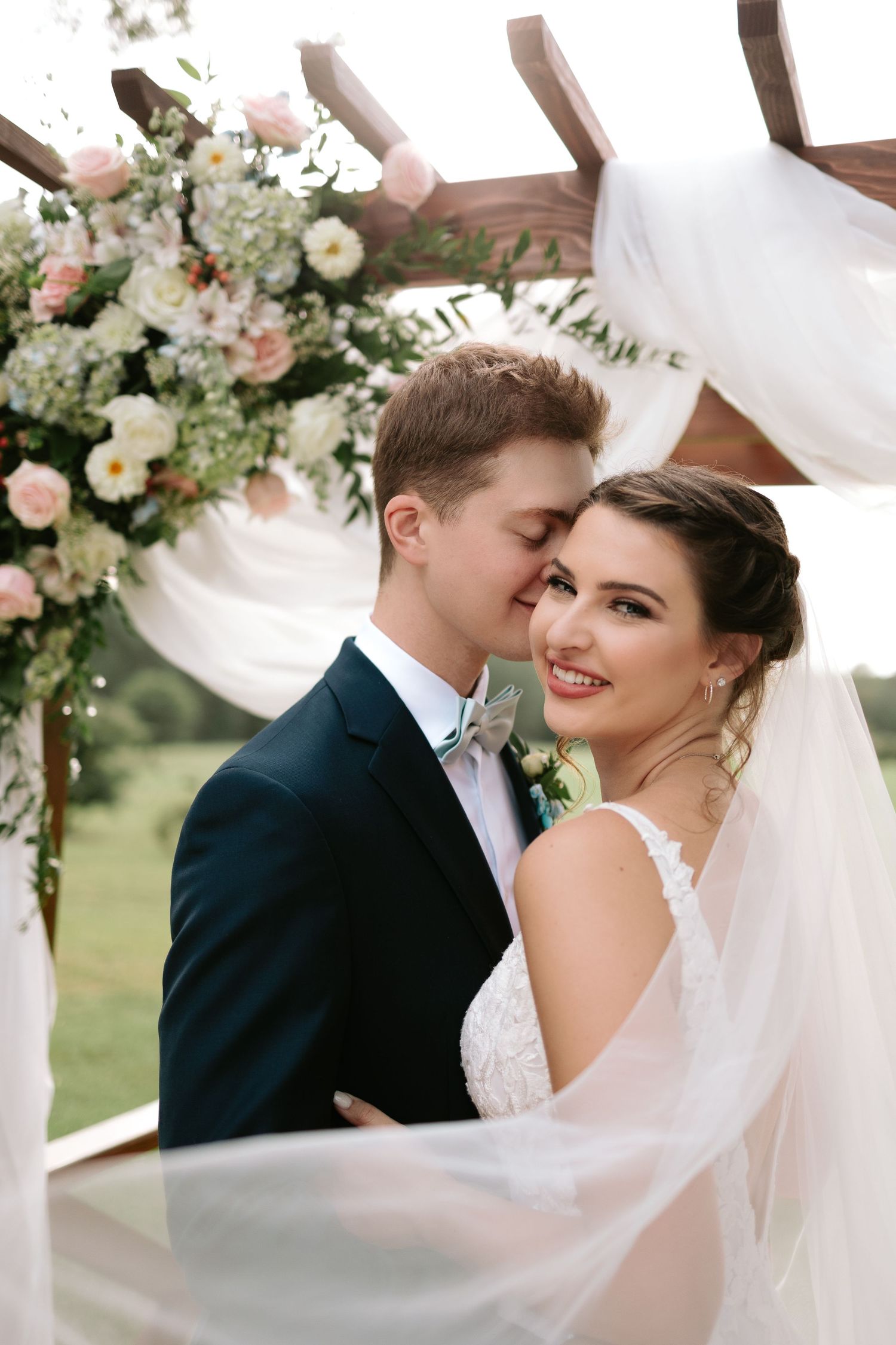 Wedding ceremony moment in Auburn, Alabama capturing emotional vows with natural, candid photography