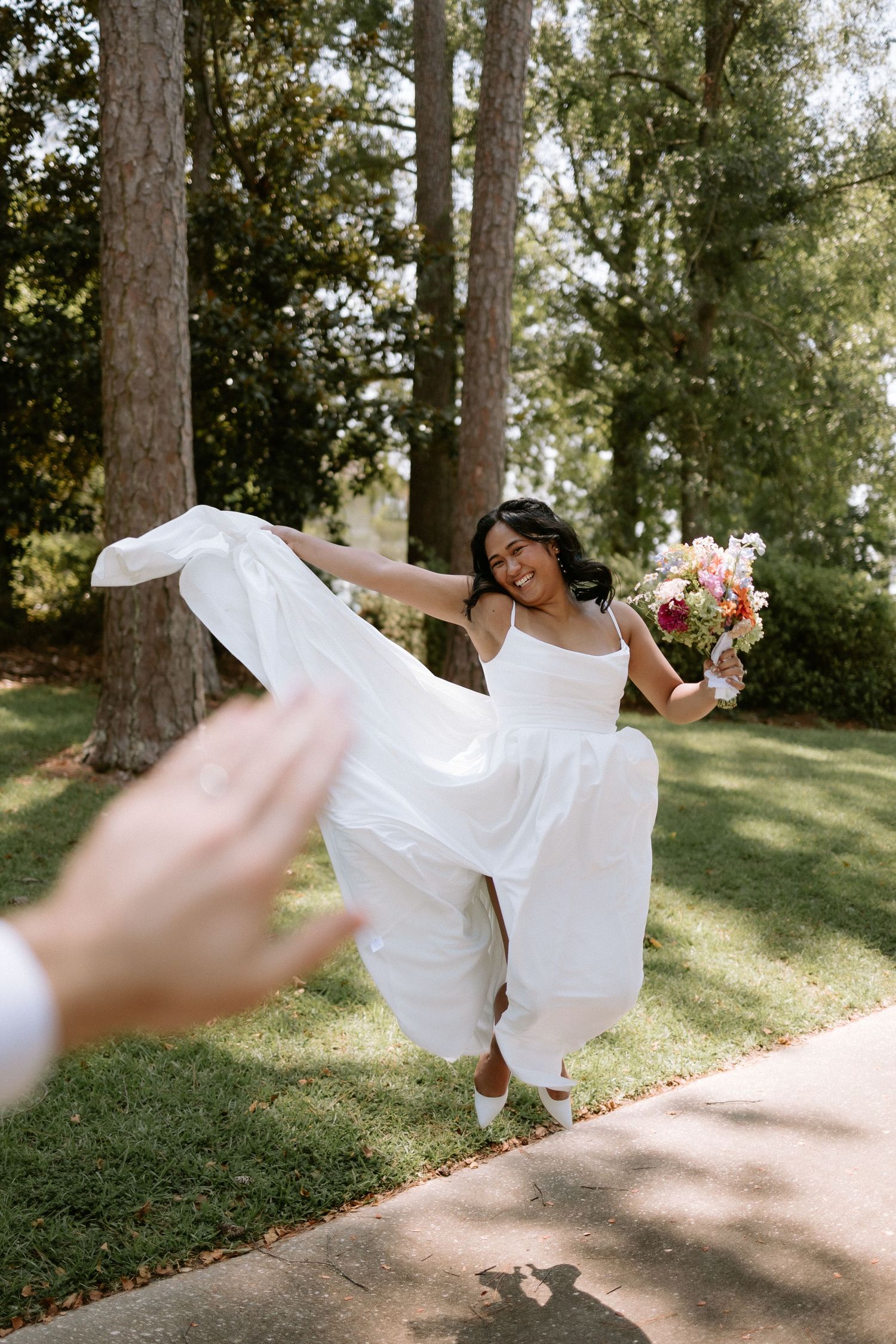 Wedding ceremony moment in Lake Martin capturing emotional vows with natural, candid photography