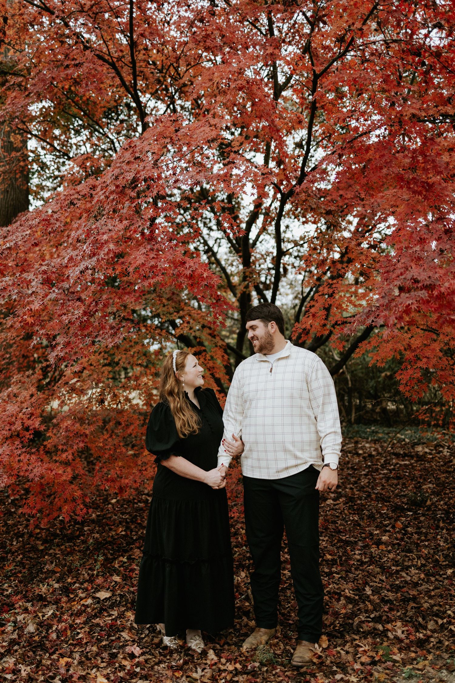 Couple embracing during a romantic elopement session in Kiesel Park, Alabama with candid storytelling photography