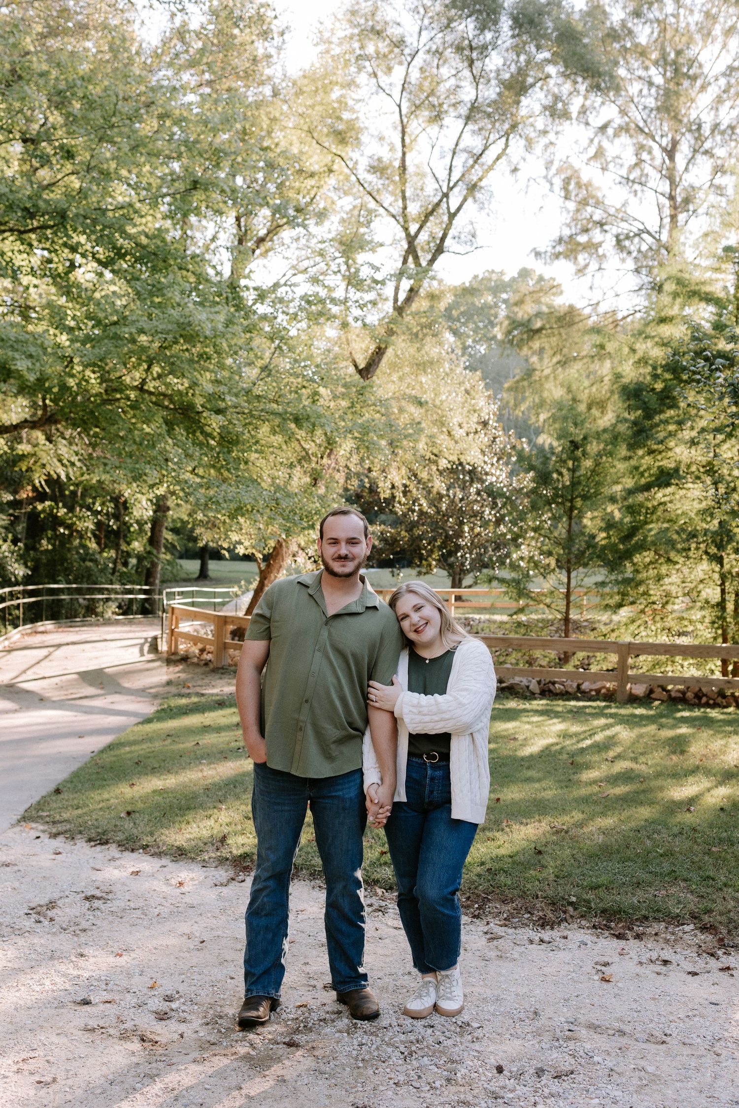 Couple embracing during a romantic elopment session in Auburn, Alabama at Kiesel Park with candid storytelling photography