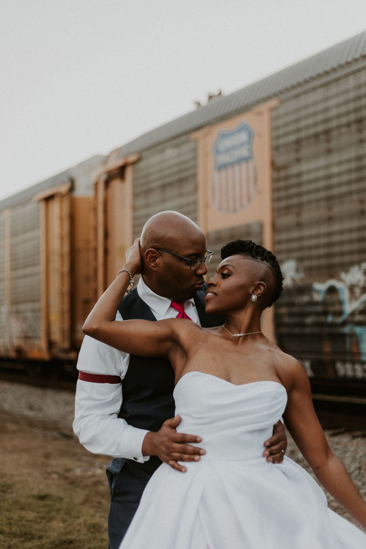Candid moment between couple in Auburn, Alabama captured with an emotional, documentary style