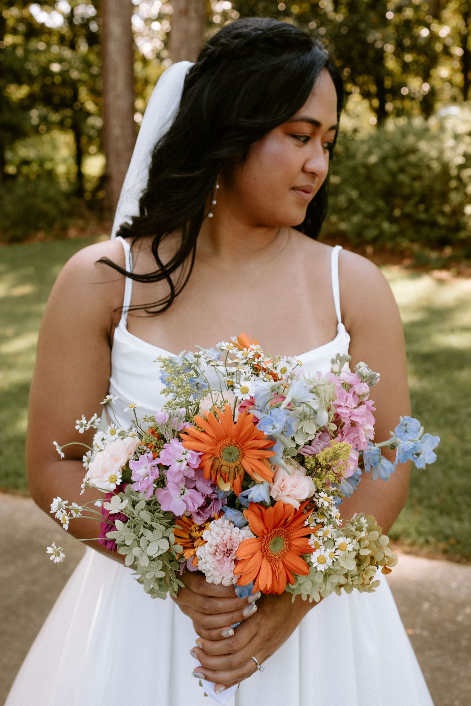 Wedding ceremony moment in Lake Martin capturing emotional vows with natural, candid photography