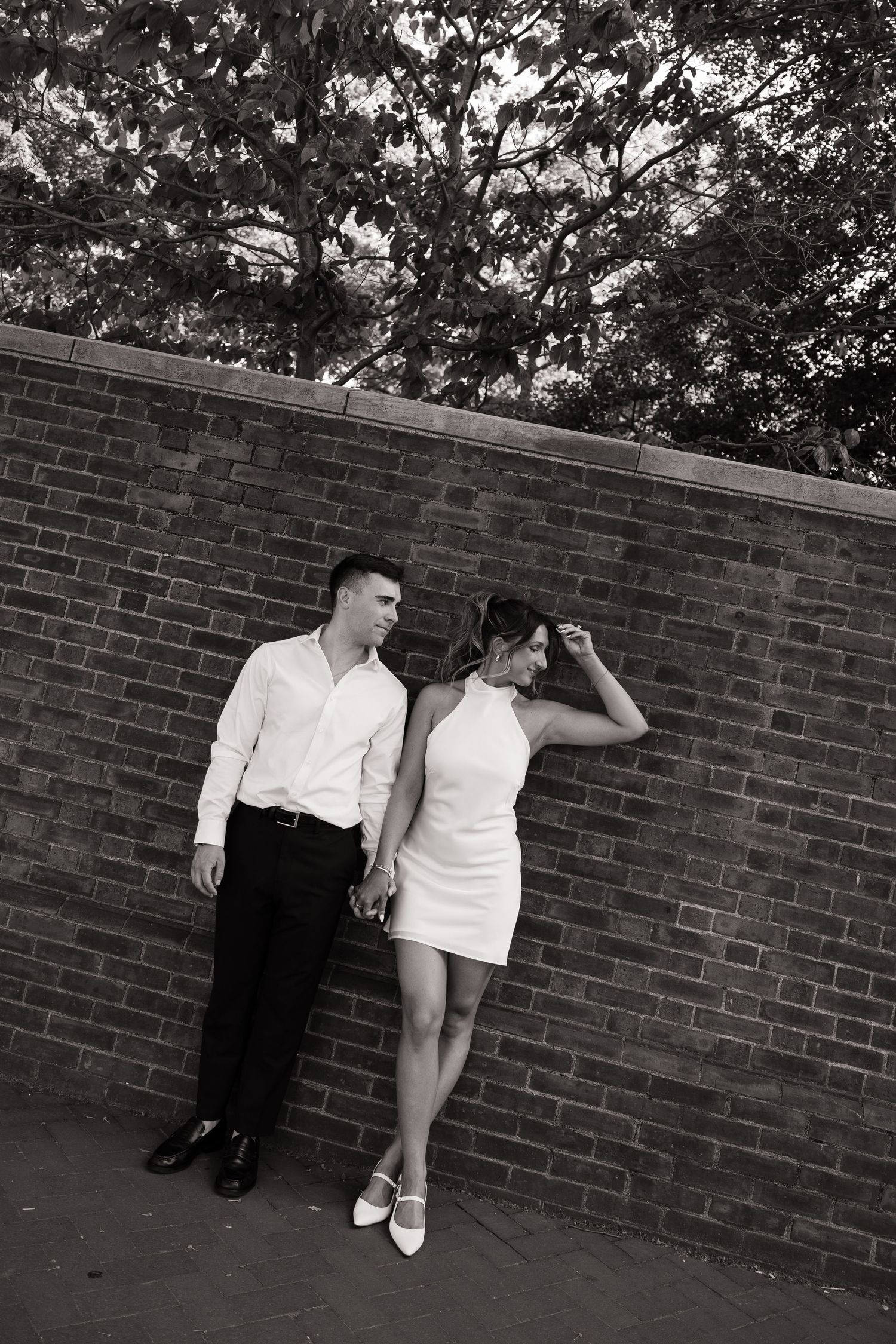 Romantic Philadelphia engagement session capturing a couple’s natural connection in the city’s iconic streets and soft golden light.