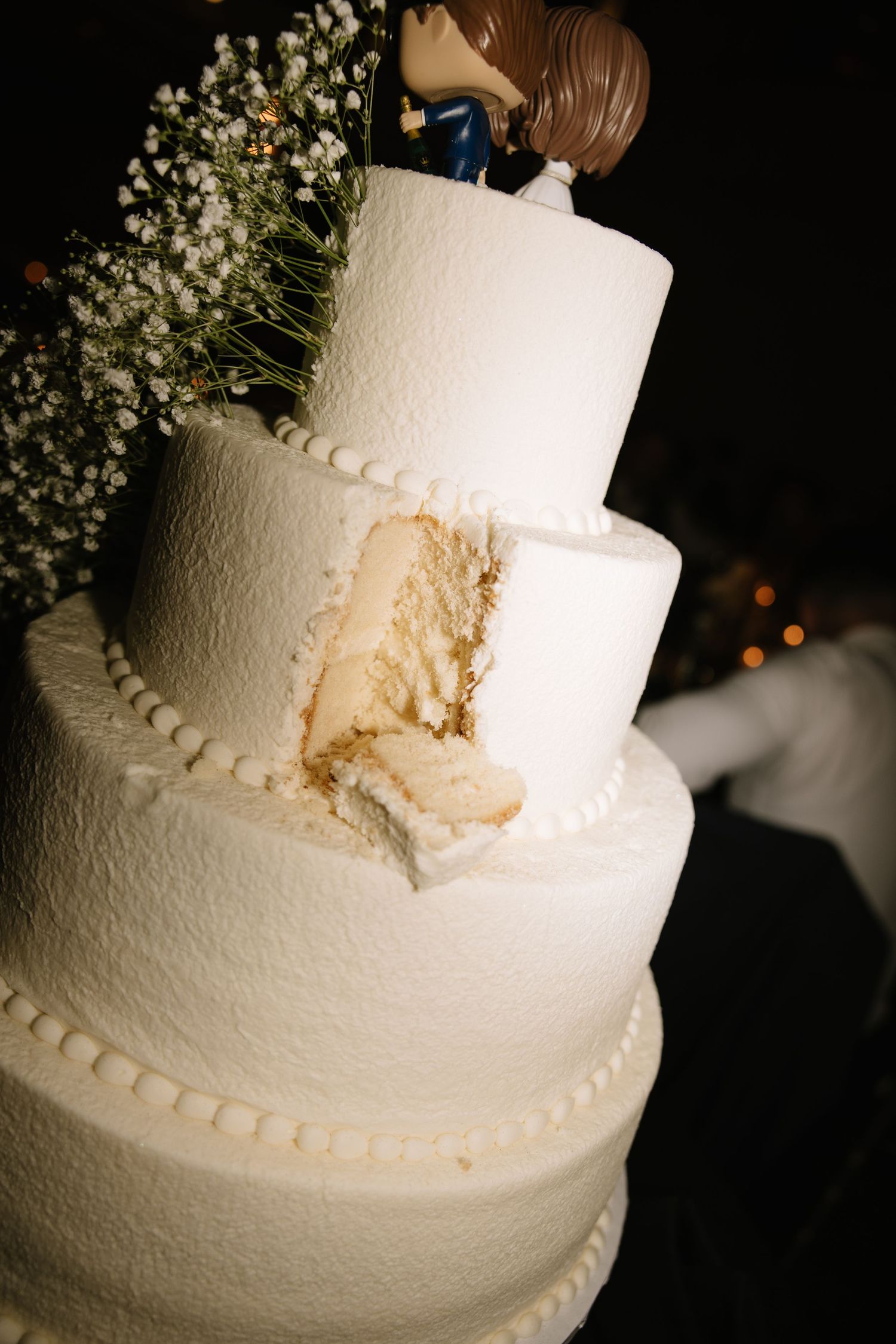 Romantic wedding portrait of newlyweds inside Philadelphia's historic Union Trust venue featuring elegant architecture and timeless details.