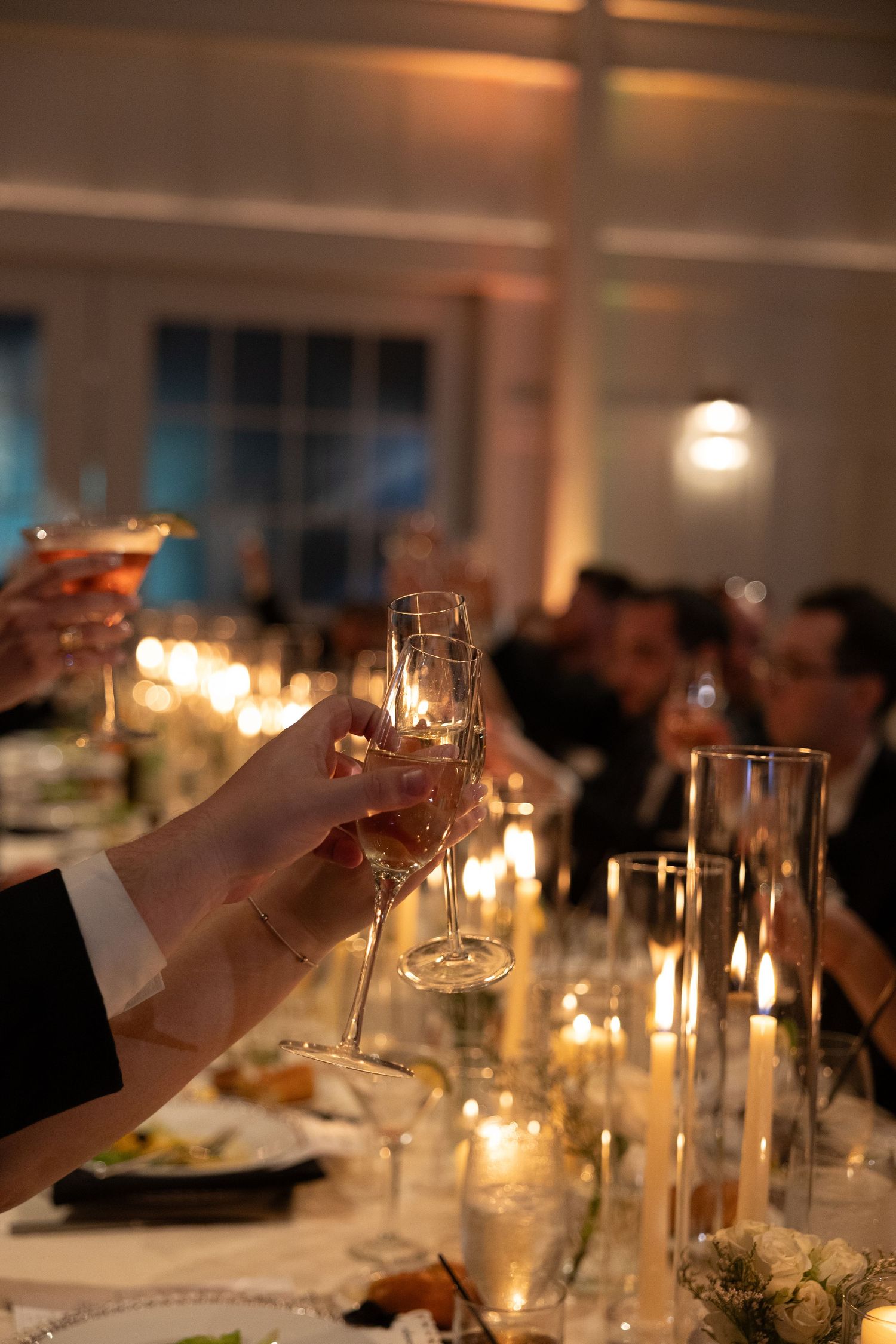 candid wedding day moment photographed by a Philadelphia wedding photographer featuring newlyweds celebrating together.