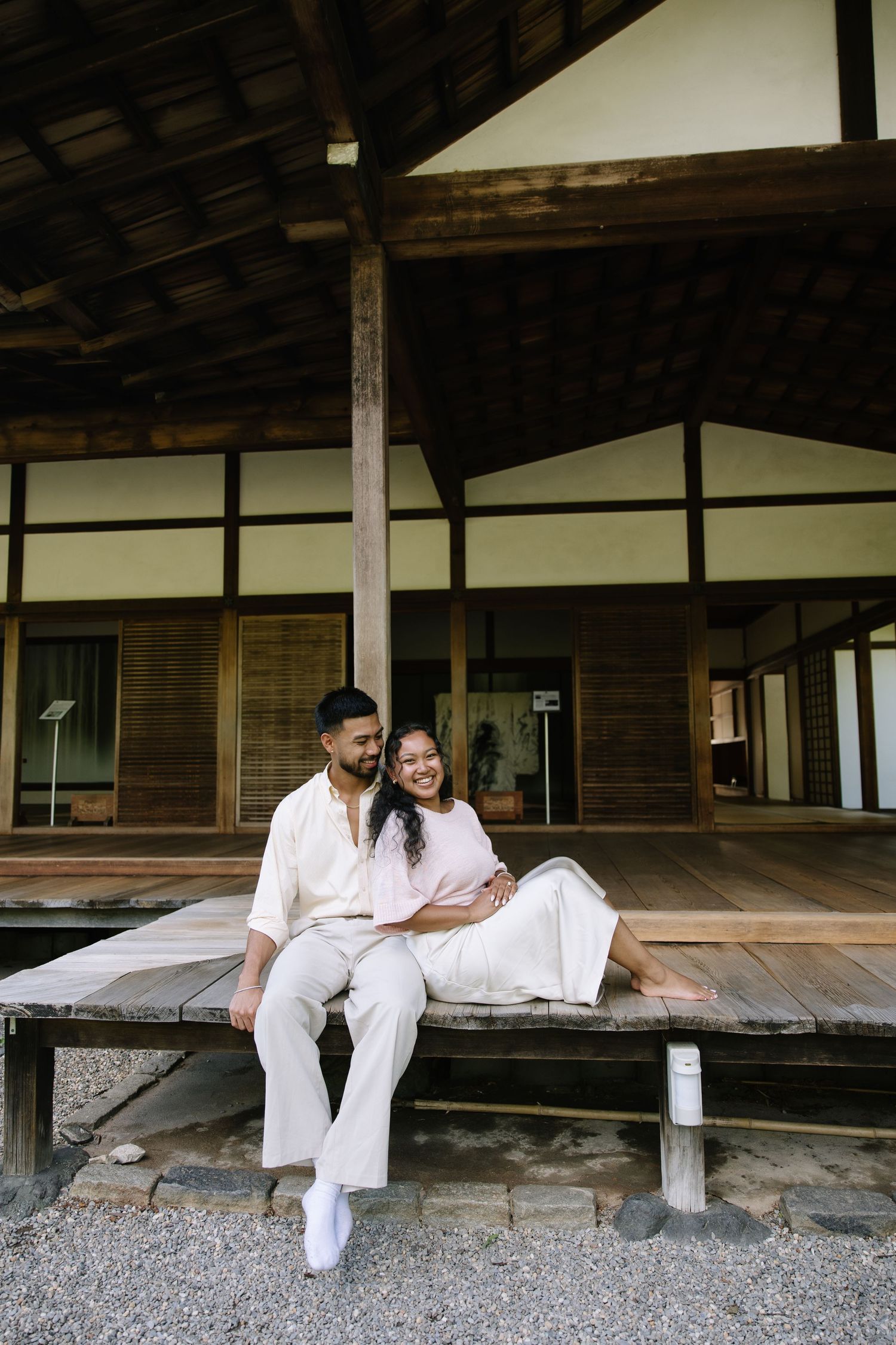 Romantic engagement session at Shofuso Japanese Garden in Philadelphia featuring serene landscapes, cherry blossoms, and soft natural light.