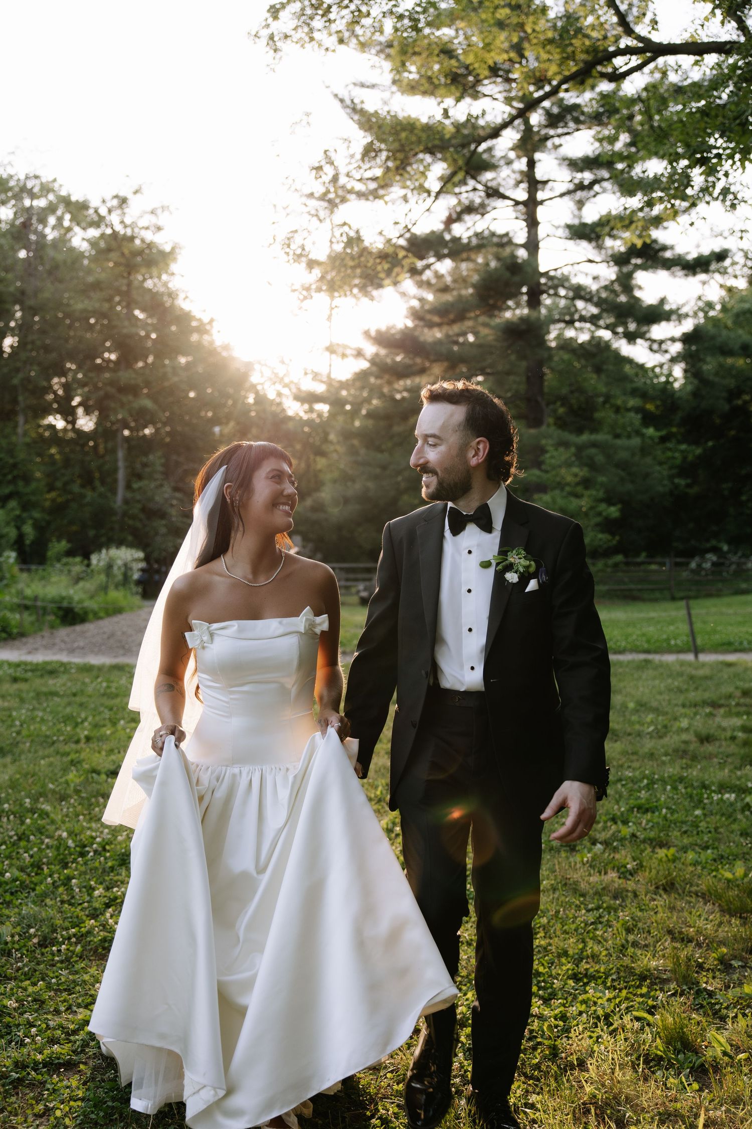 Romantic Bartram’s Garden wedding in Philadelphia featuring lush greenery, historic gardens, and a joyful couple in natural light.