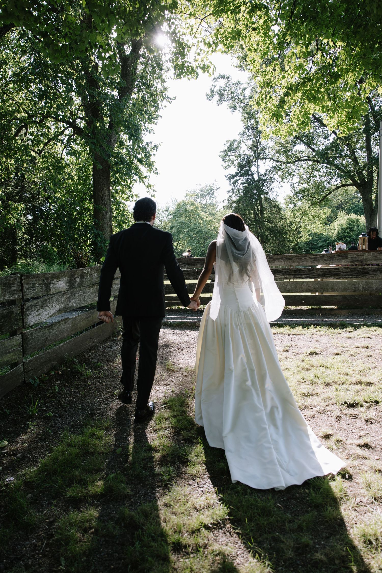 candid wedding day moment photographed by a Philadelphia wedding photographer featuring newlyweds celebrating together.
