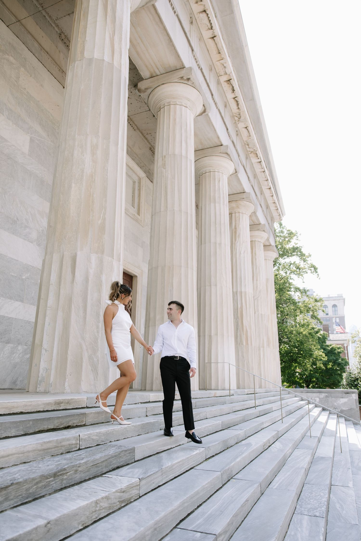 Romantic Philadelphia engagement session capturing a couple’s natural connection in the city’s iconic streets and soft golden light.