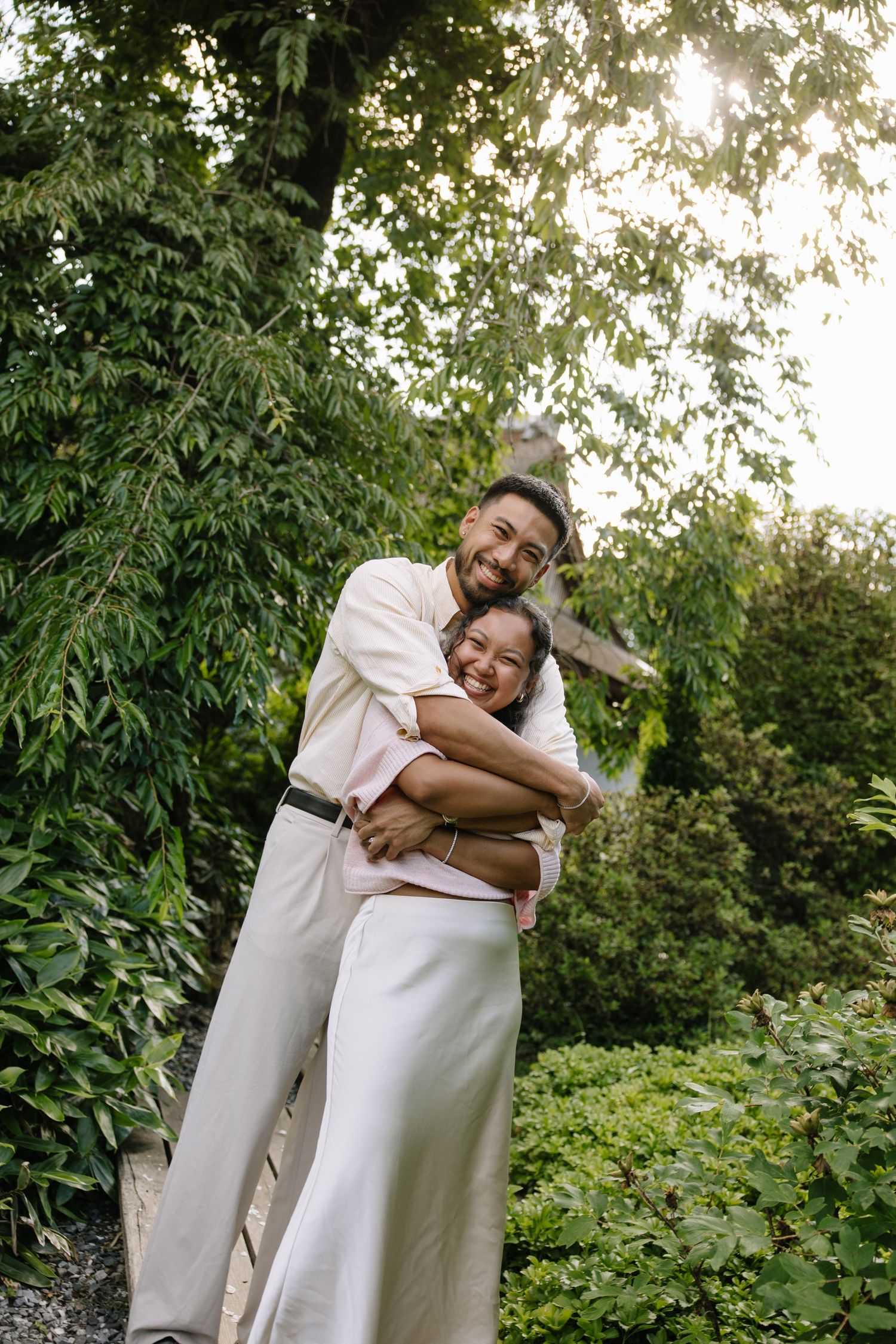 Romantic engagement session at Shofuso Japanese Garden in Philadelphia featuring serene landscapes, cherry blossoms, and soft natural light.