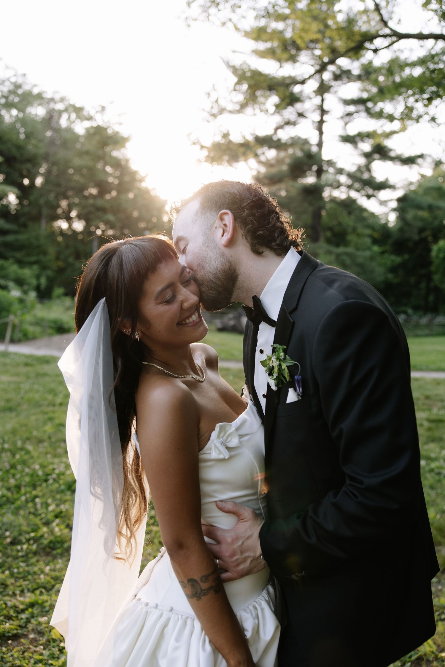 Romantic Bartram’s Garden wedding in Philadelphia featuring lush greenery, historic gardens, and a joyful couple in natural light.