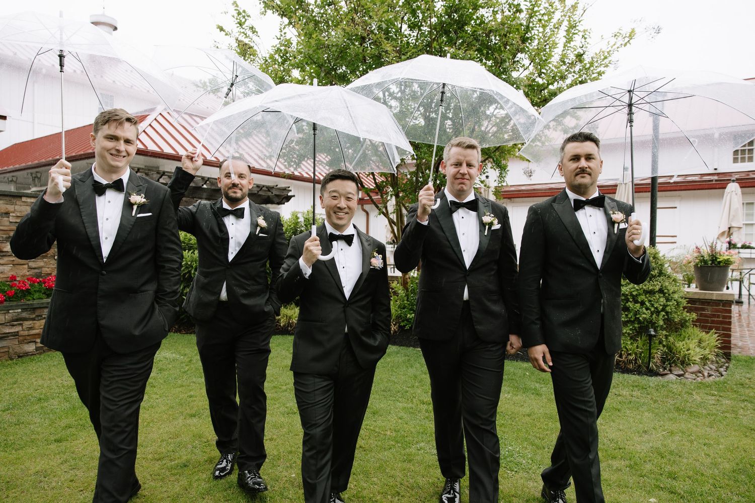 candid wedding day moment photographed by a Philadelphia wedding photographer featuring newlyweds celebrating together.
