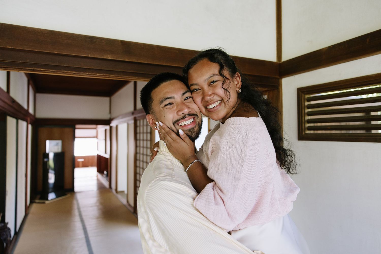 Romantic engagement session at Shofuso Japanese Garden in Philadelphia featuring serene landscapes, cherry blossoms, and soft natural light.