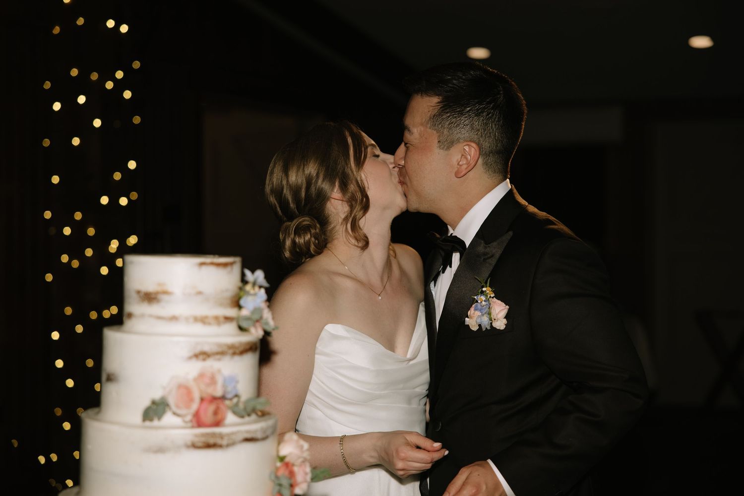 candid wedding day moment photographed by a Philadelphia wedding photographer featuring newlyweds celebrating together.