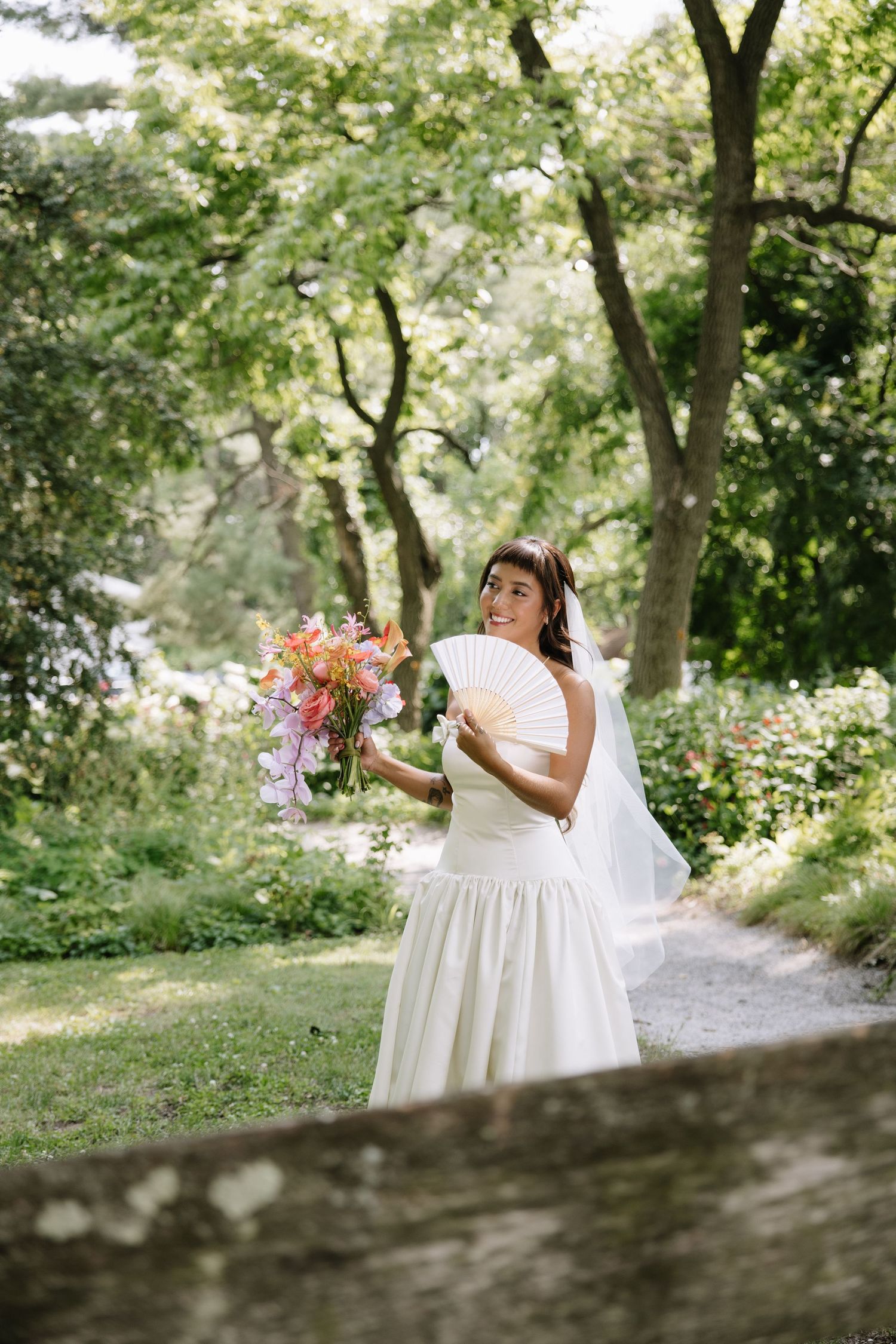 candid wedding day moment photographed by a Philadelphia wedding photographer featuring newlyweds celebrating together.