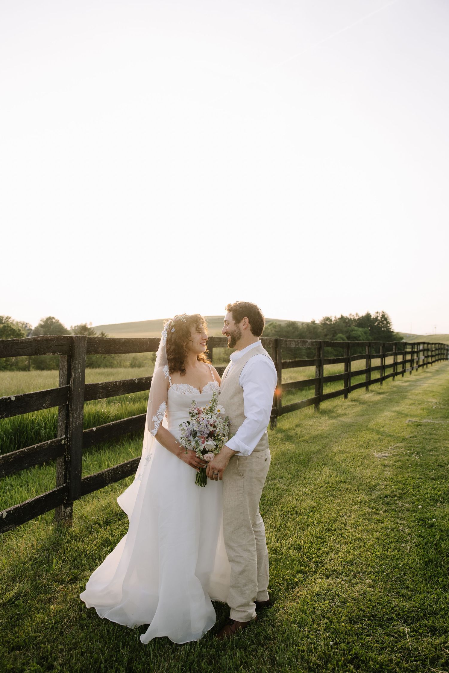 Philadelphia wedding photographer capturing a joyful bride and groom during romantic wedding portraits in Pennsylvania.