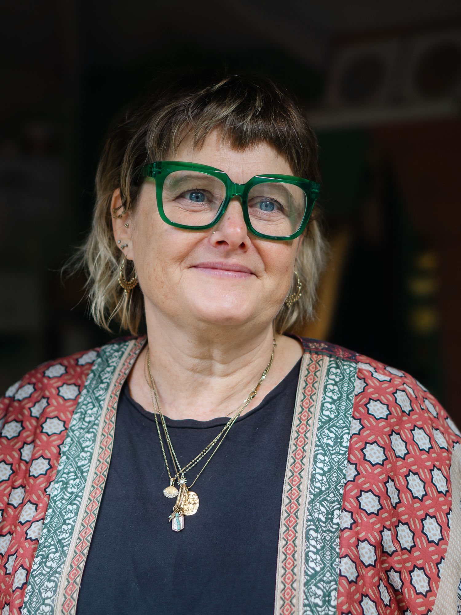 Lucy Dinata, Newton Abbot based tattooist and piercer, looking relaxed on her shoot with Felicity billen