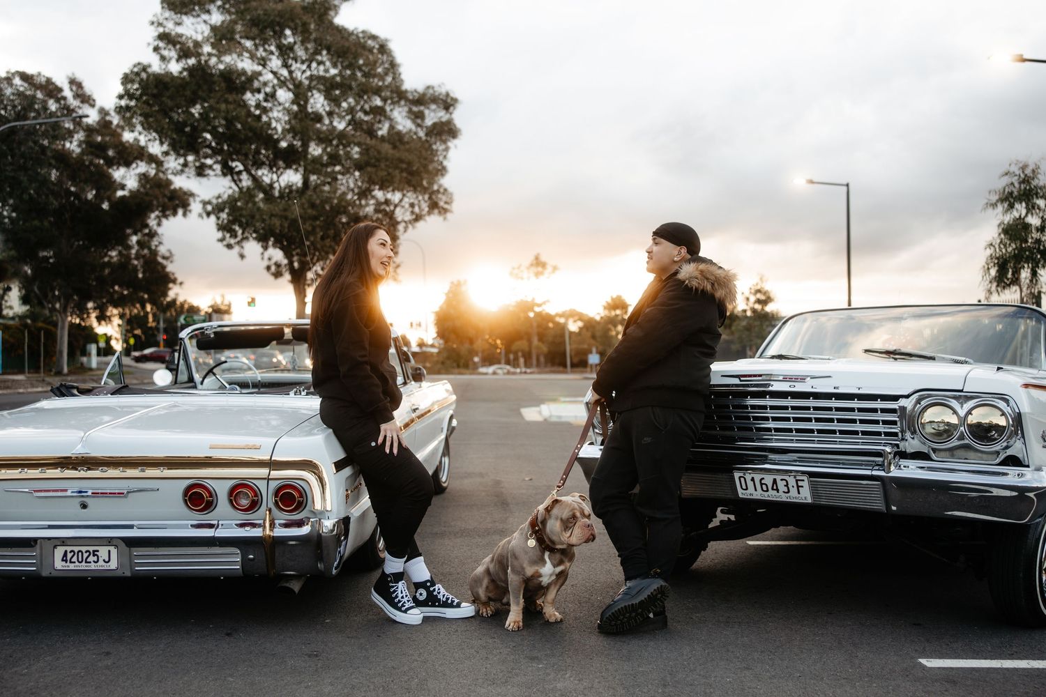 Man and Woman on a Classic Car Date with their dog.