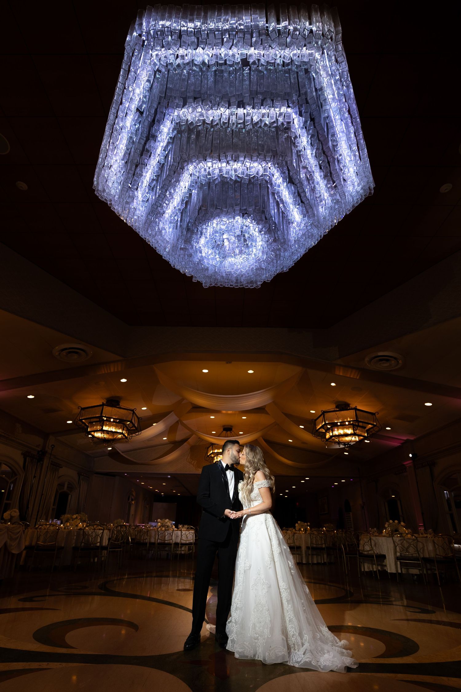 Luxury wedding couple in reception hall