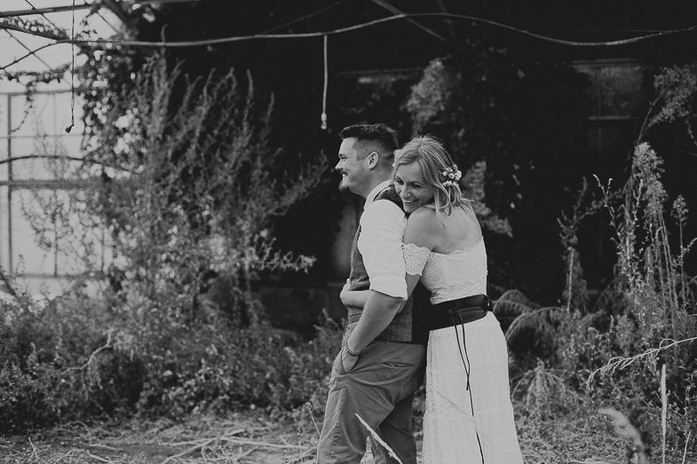 A vintage black and white photograph captured in a garden setting.